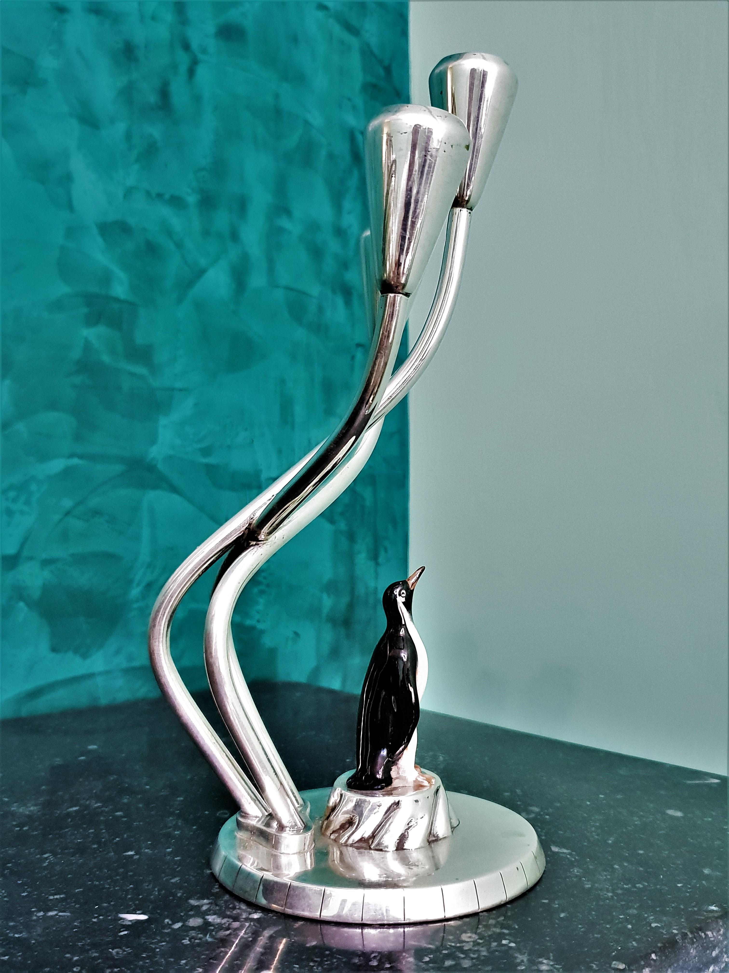 Splendid silver candlestick with a very modern design and enriched with enameled sculpture of a penguin on the circular base.

Presumably realized in Sweden between the end of 19th century and the beginning of 20th century.

Wonderful