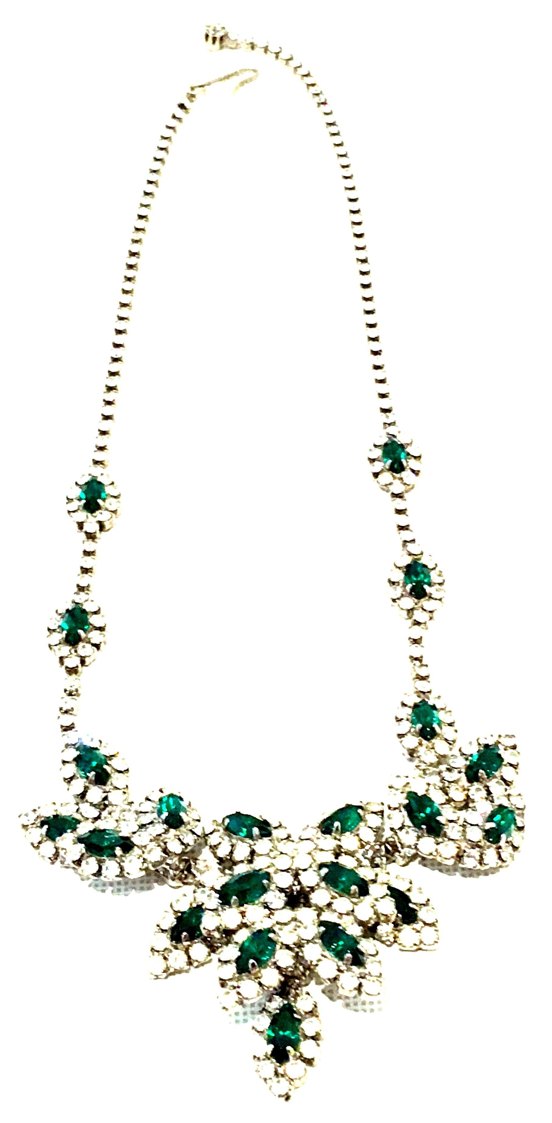 20th Century Silver Plate & Austrian Crystal Dimensional Abstract Flora Necklace In the Manner Of Kramer New York. This finely crafted piece set in silver plate metal
with exceptional quality brilliant cut and faceted Austrian colorless and emerald