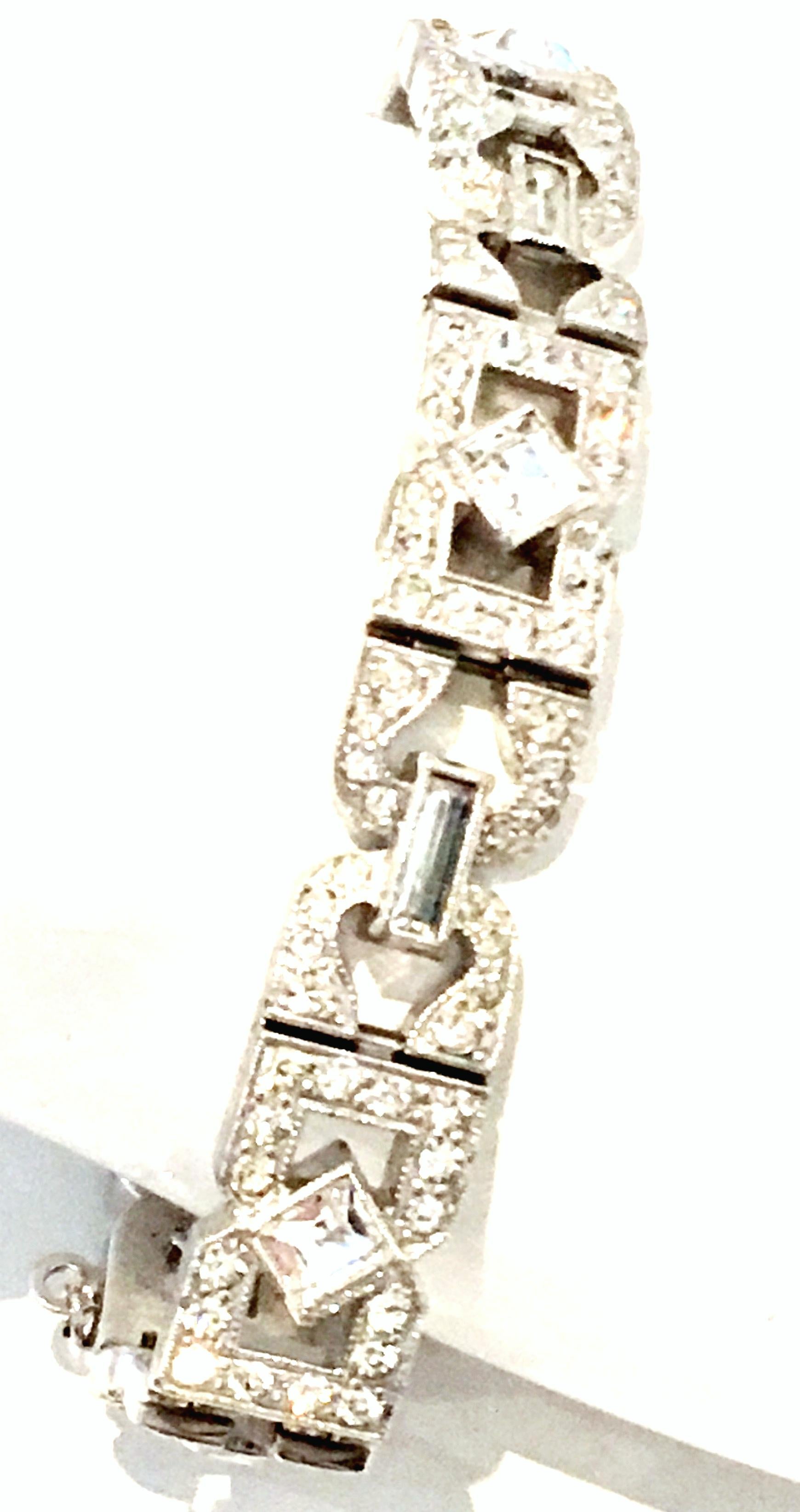 Mid-20th Century Art Deco Silver & Austrian Crystal Link Bracelet By, Engel Brothers, Inc.  This rare and coveted Art Deco Sterling Silver Rhodium Plate with the finest quality of brilliant and colorless stones features, pave set round, baguette and