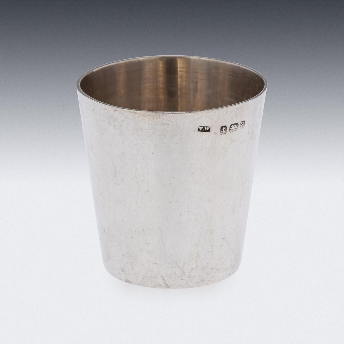 Antique 20th Century Edwardian solid silver spirit measure cup from the R.M.S Cedric. The measure, of traditional size in a tapering body form has an enamel White Star Line flag (Attribution to the famous Titanic company) on the centre middle,