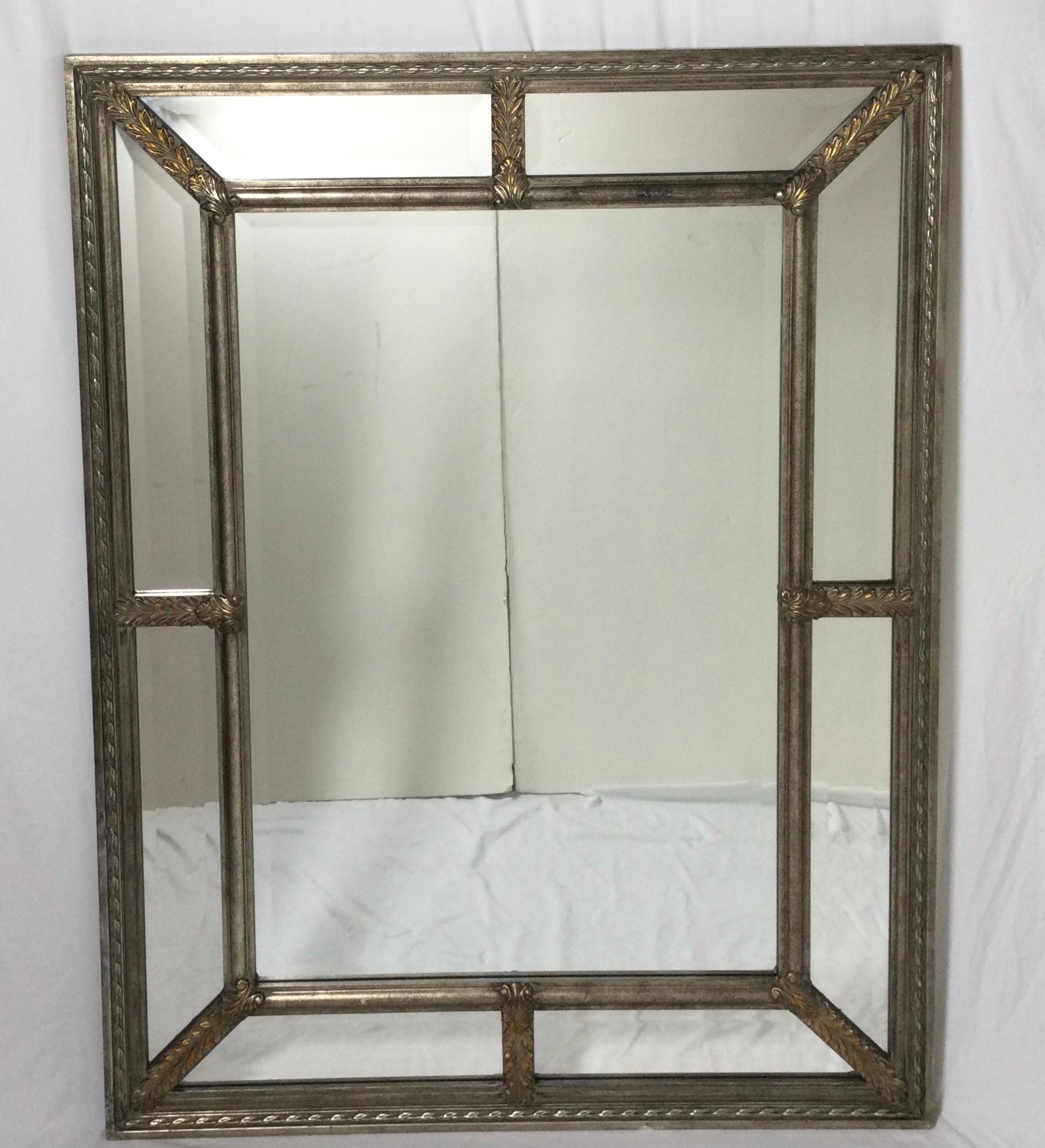 20th century Silver Gilt Venetian style beveled mirror with gilt gold accents. Every separate mirror is beveled which gives such great light. Great design and hard to find silver color.
Dimensions; 49
