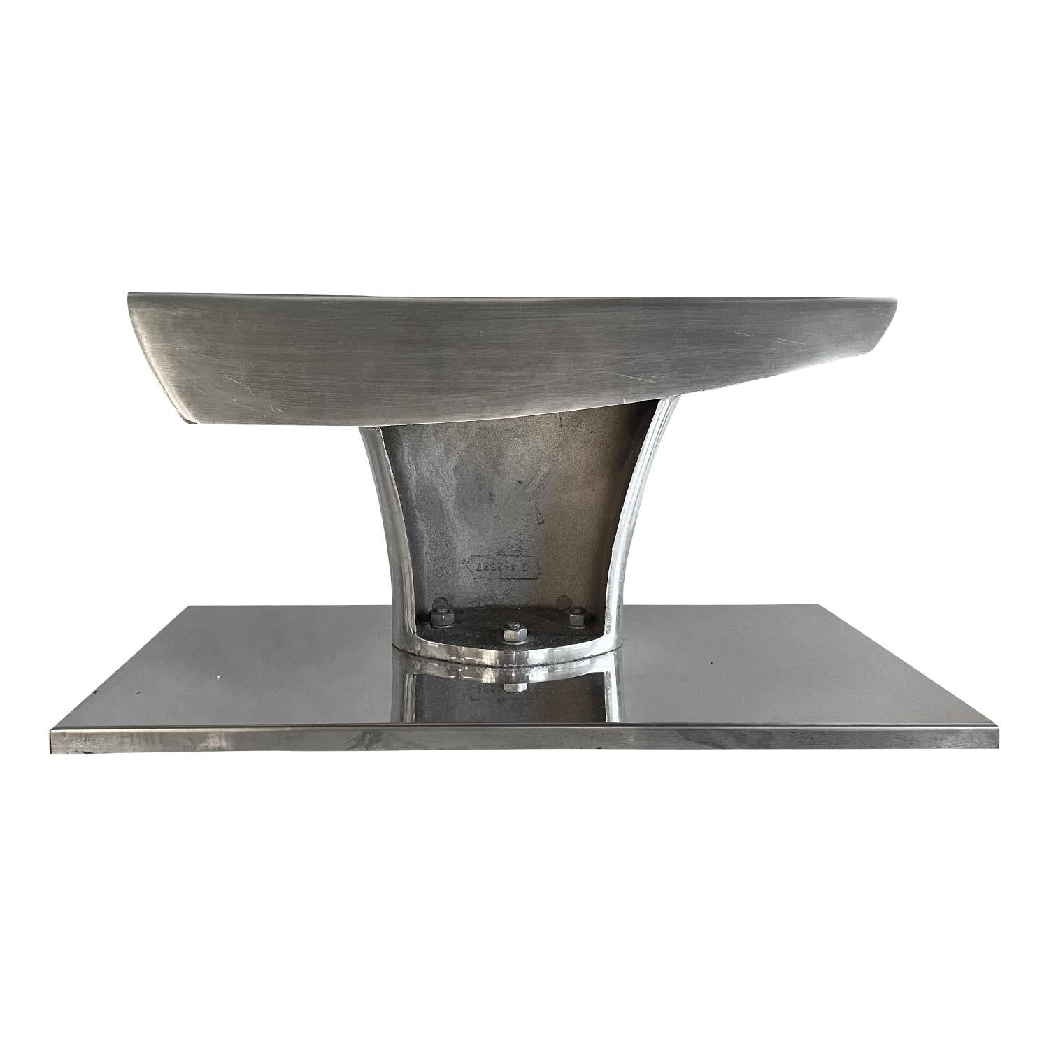 A silver, vintage Mid-Century Modern Italian object d'Art made of hand crafted aluminum on a rectangular base bollard, in good condition. Wear consistent with age and use, circa 1960 Milan, Northern Italy.