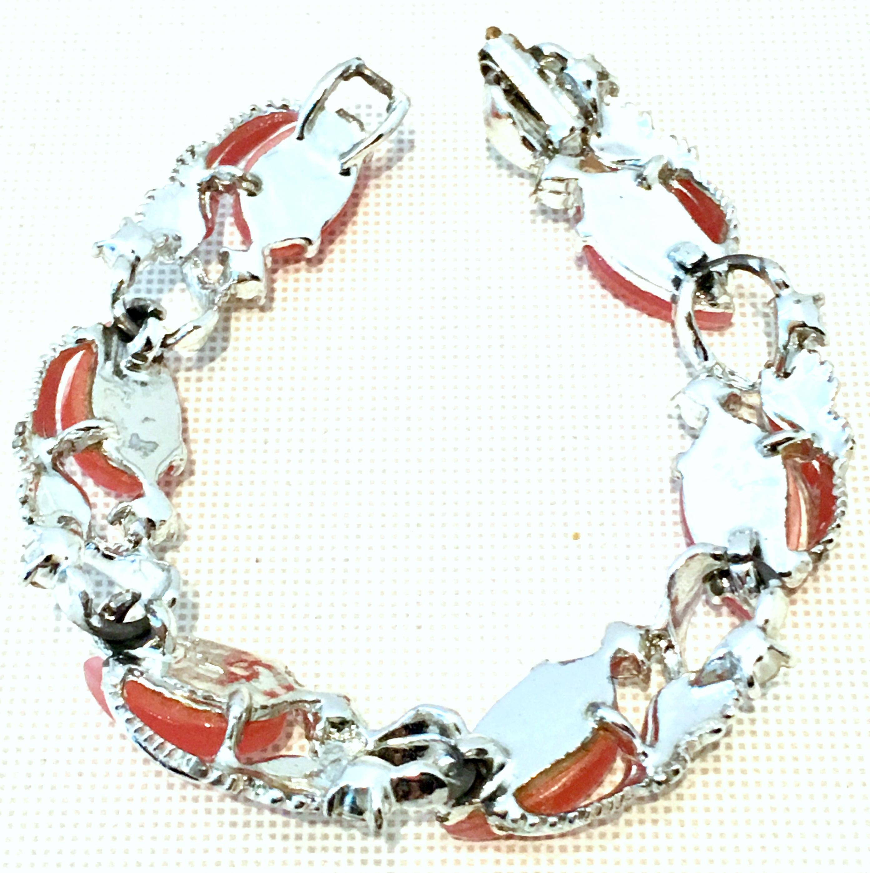 20th Century Silver, Pink Lucite & Austrian Crystal Link Bracelet By, Coro. This lovely link bracelet by Coro features, silver plate fancy prong set iridescent pink Lucite stones with Aurora Borealis cut and faceted brilliant stone accent. Fold over