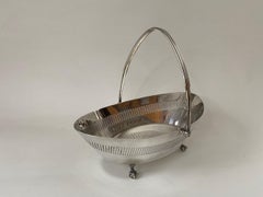 20th Century Silver Plate English Oval Basket with Handle on Ball & Claw Feet