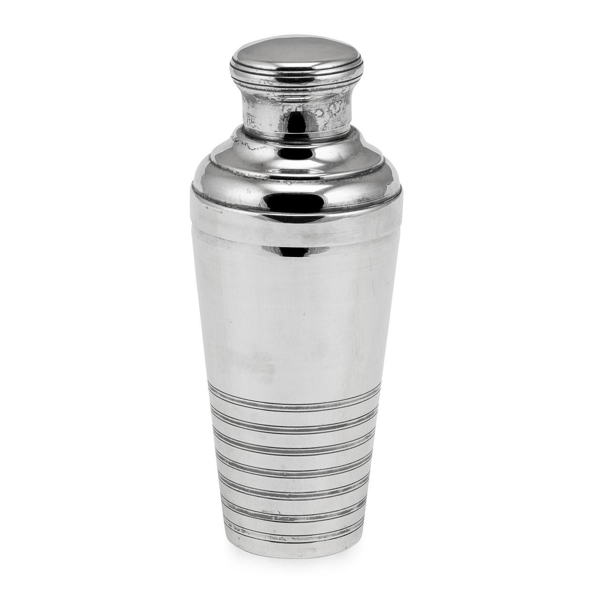 A charming silver plated cocktail shaker, of French origin and dating back to the mid-20th century. Exquisite in its craftsmanship, the cocktail shaker is of clear Art Deco form, reminiscent of the distinctive designs that characterised the early