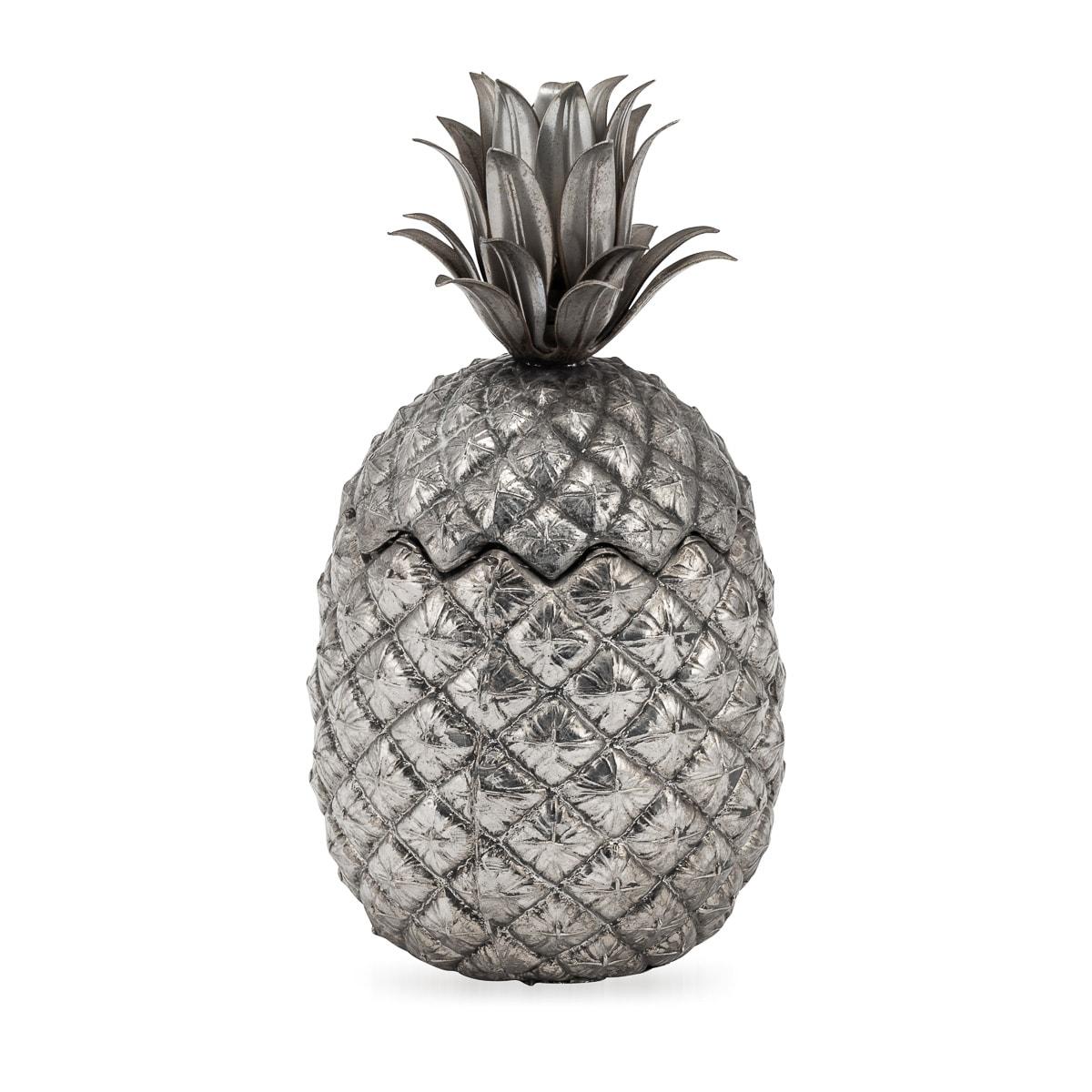A stunning ice bucket designed by Mauro Manetti, originating from Italy in the vibrant era of the 1970s. This exceptional piece, shaped like a pineapple, showcases the creative brilliance of Mauro Manetti and was meticulously crafted for the