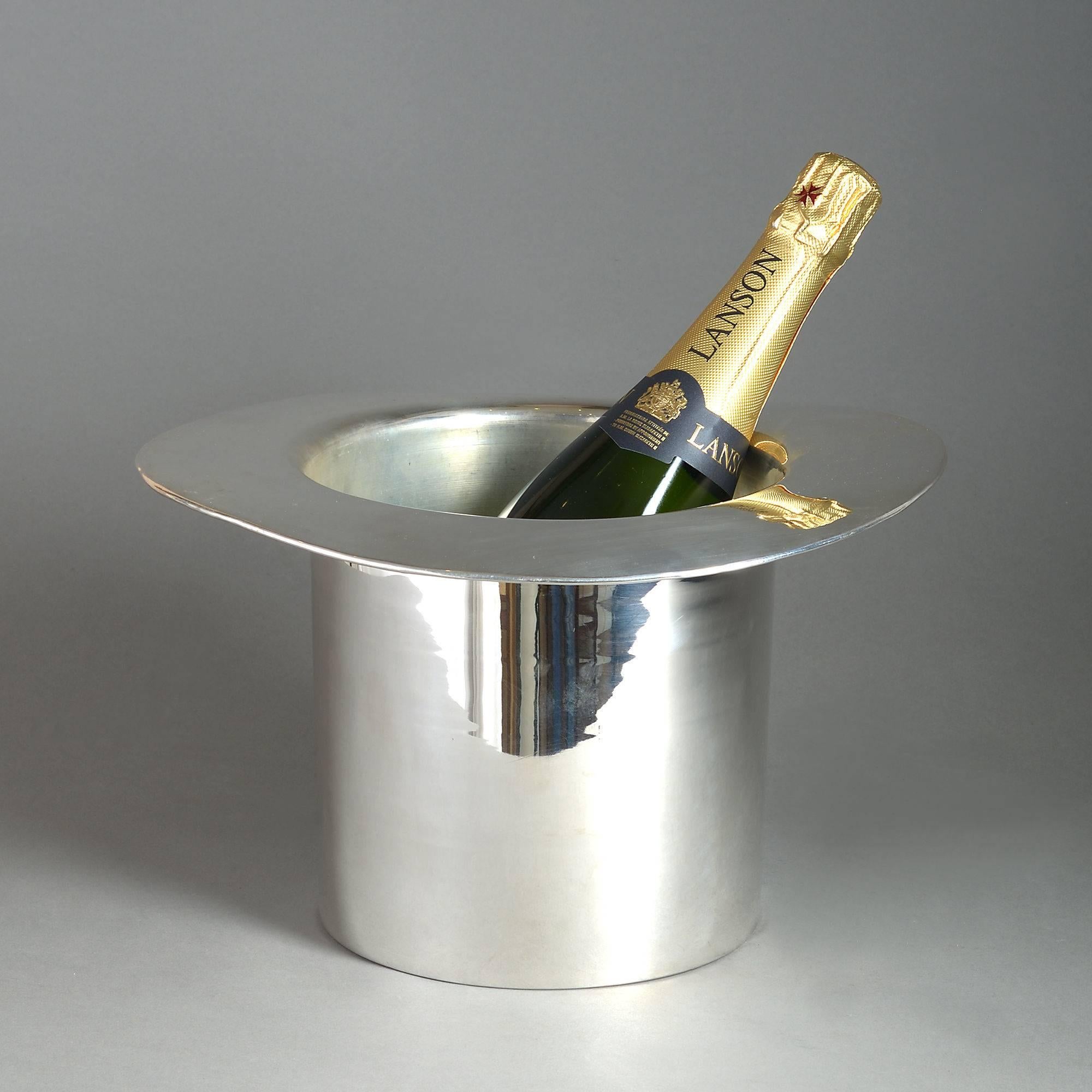 A mid-20th century silver plated champagne ice bucket, fashioned in the form of a top hat.