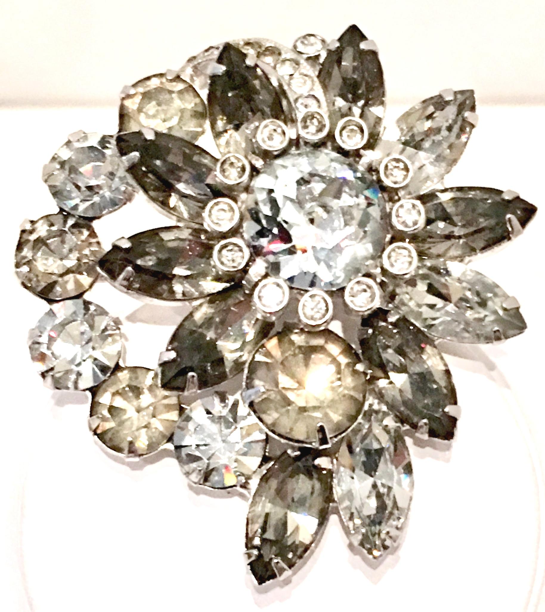 1970'S Silver & Swarovski Crystal Dimensional Abstract Floral Brooch By, Eisenberg Ice. This classic silver rhodium plate prong and pave set brooch features, Swarovski crystal clear and 