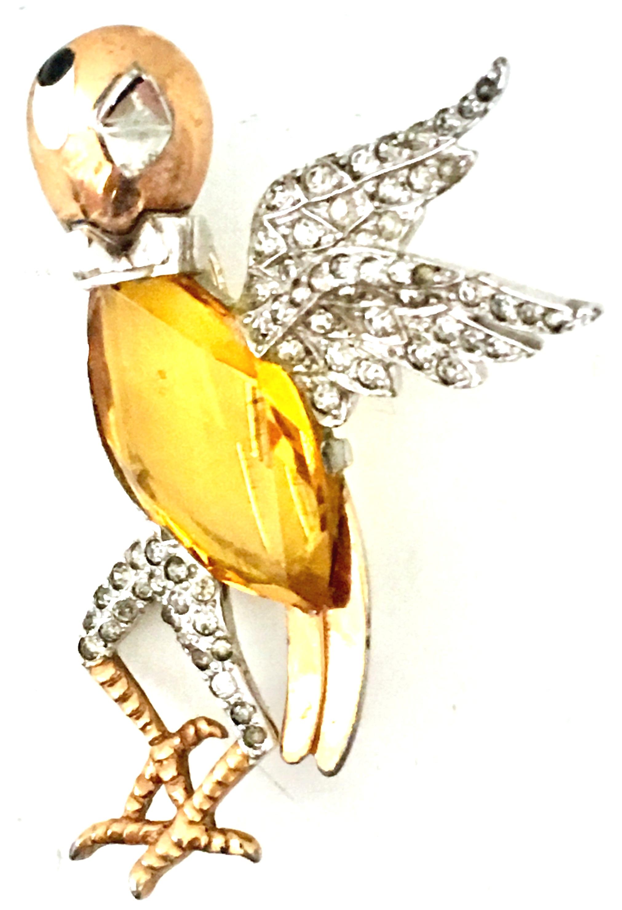 20th Century Silver And Gold Vermeil, Enamel Faceted Cut Art Glass & Austrian Crystal Singing Bird Brooch By, Marcel Boucher. This rare and coveted large scale brooch features a brilliant cut and faceted citrine art glass central stone surrounded by