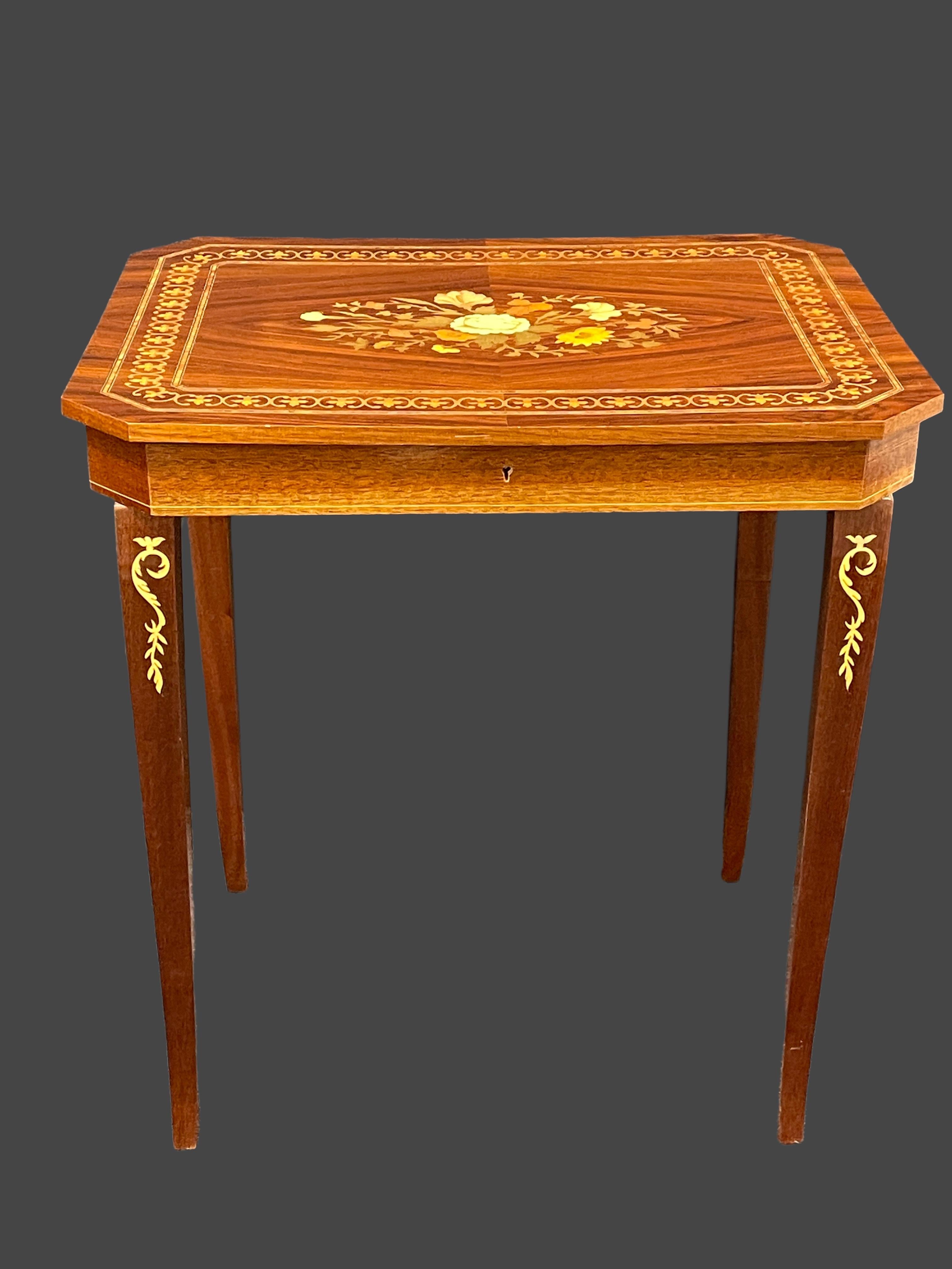 Beautiful Italian 20th century small rectangular wood side or end table with decorative inlaid top, cabriolet legs, private jewelry compartment and music box. It is approx. 2.63