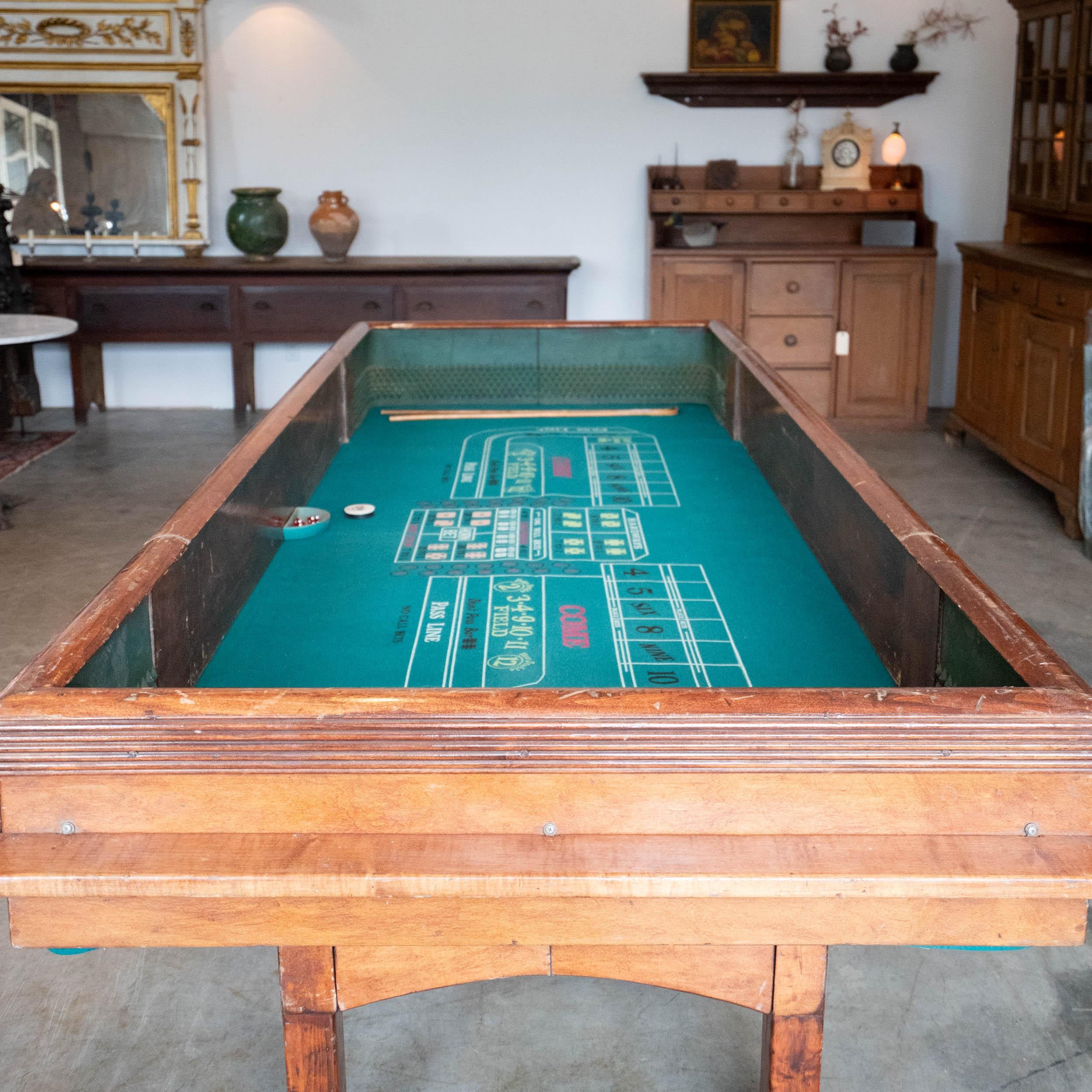 A unique and authentic Craps table  in full size  with collapsable features to allow for easy dismantle and shipping .  This piece was found in eastern USA and has not been altered in any way ...The wood is a solid maple with original untouched