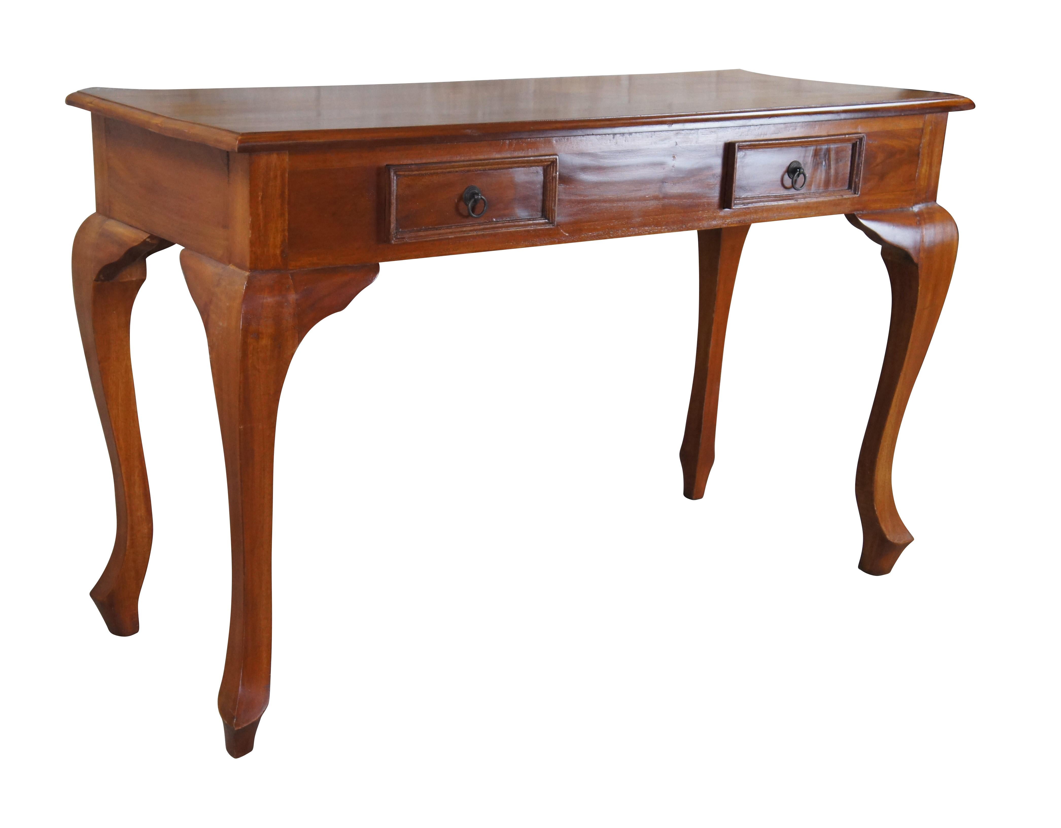 Late 20th century mahogany console, hall or table. Features a rectangular form with two dovetailed drawers and ring pulls within the frieze. Inspired by the Queen Anne period with shapely cabriole legs. Great for use as a console, tv stand or vanity