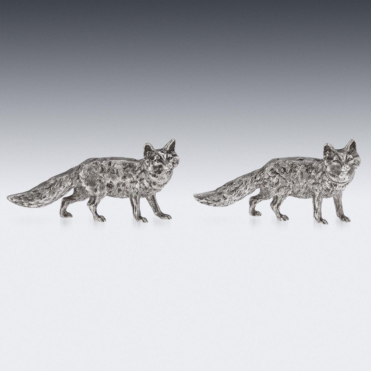 Novelty 20th Century very rare solid silver pair of novelty salt & pepper, each beautifully cast and realistically modelled as prowling foxes, the body cast with a detailed textured fur, detachable heads. Hallmarked English silver (925 standard),