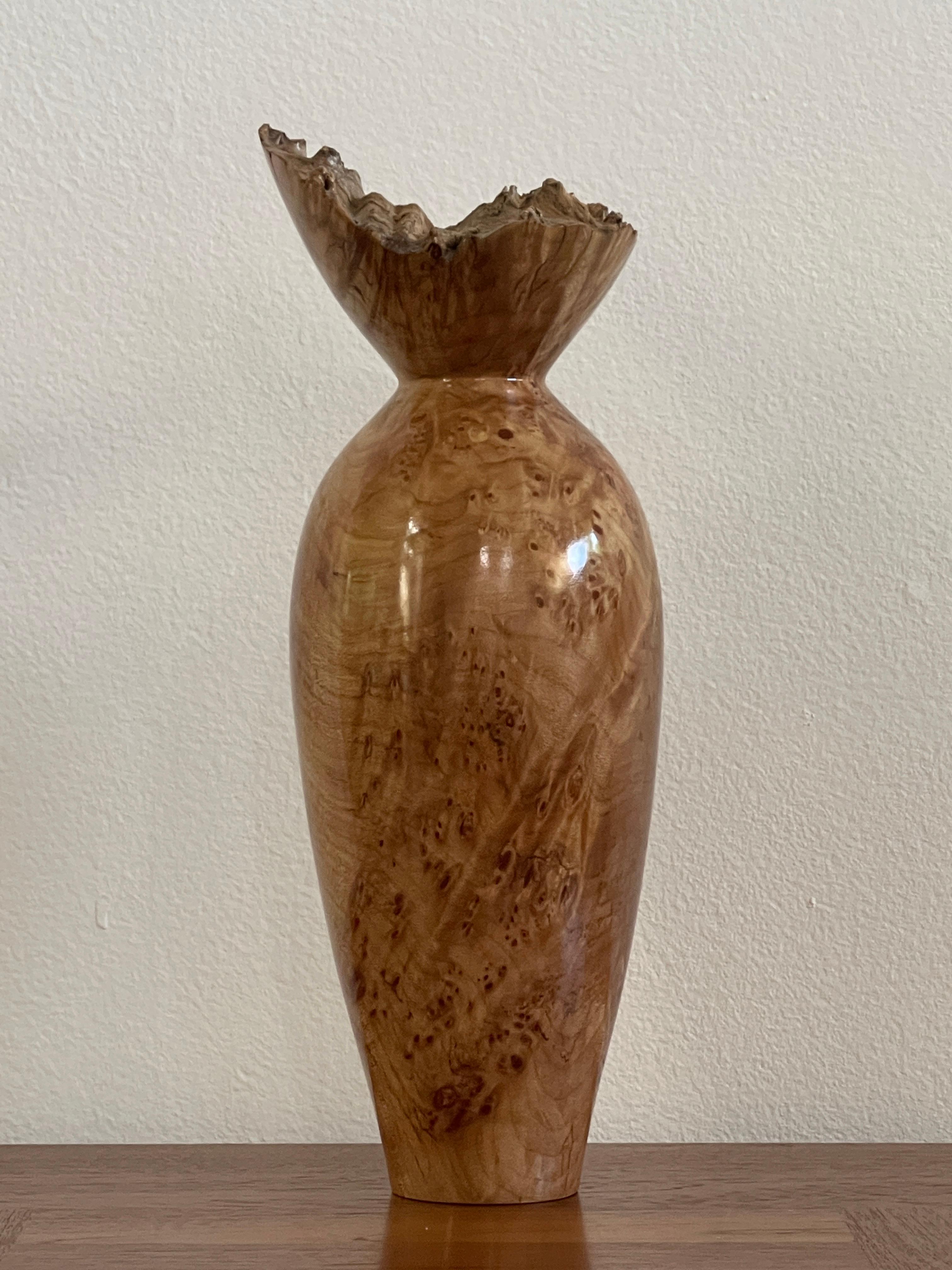 20th Century spalted maple burlwood vase by John Mascoll. This turned wood vessel was crafted by highly regarded Florida based artisan John Mascoll and is composed of Spalted Maple Burl wood. Mascoll, award winning member of the American Association