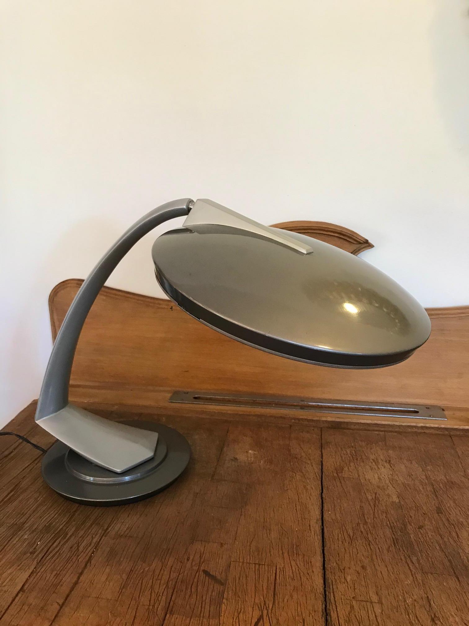Very nice 20th century Spanish articulated desk lamp designed by Fase in the 1970s. 
The top of the lamp (the light part) is articulated, it can turn up and down. 
Bi-color lamp, two types of grey. 
Very good quality. 
The light manufacturer