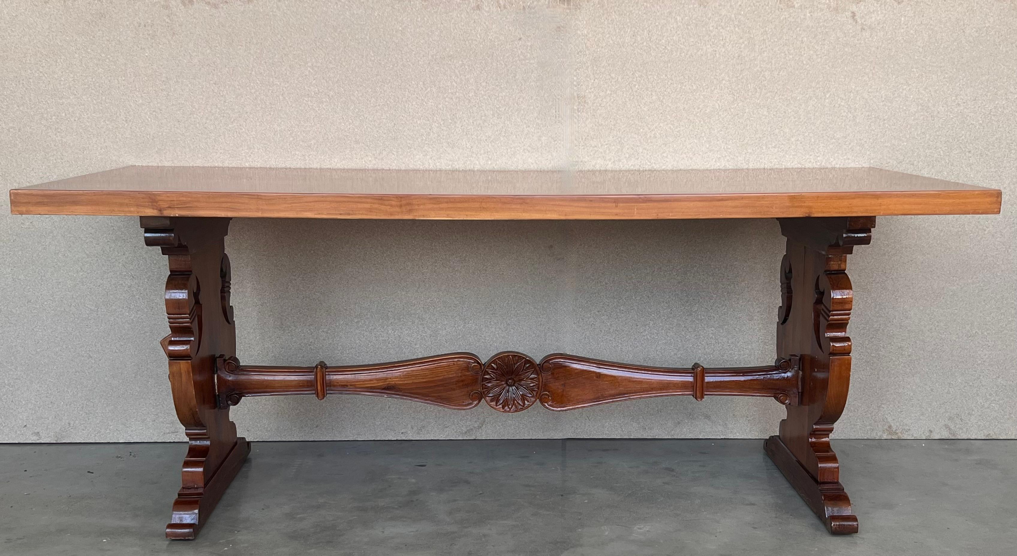 20th Century Spanish Baroque Carved Walnut Lyre Legs Trestle Dining Farm Table In Good Condition For Sale In Miami, FL