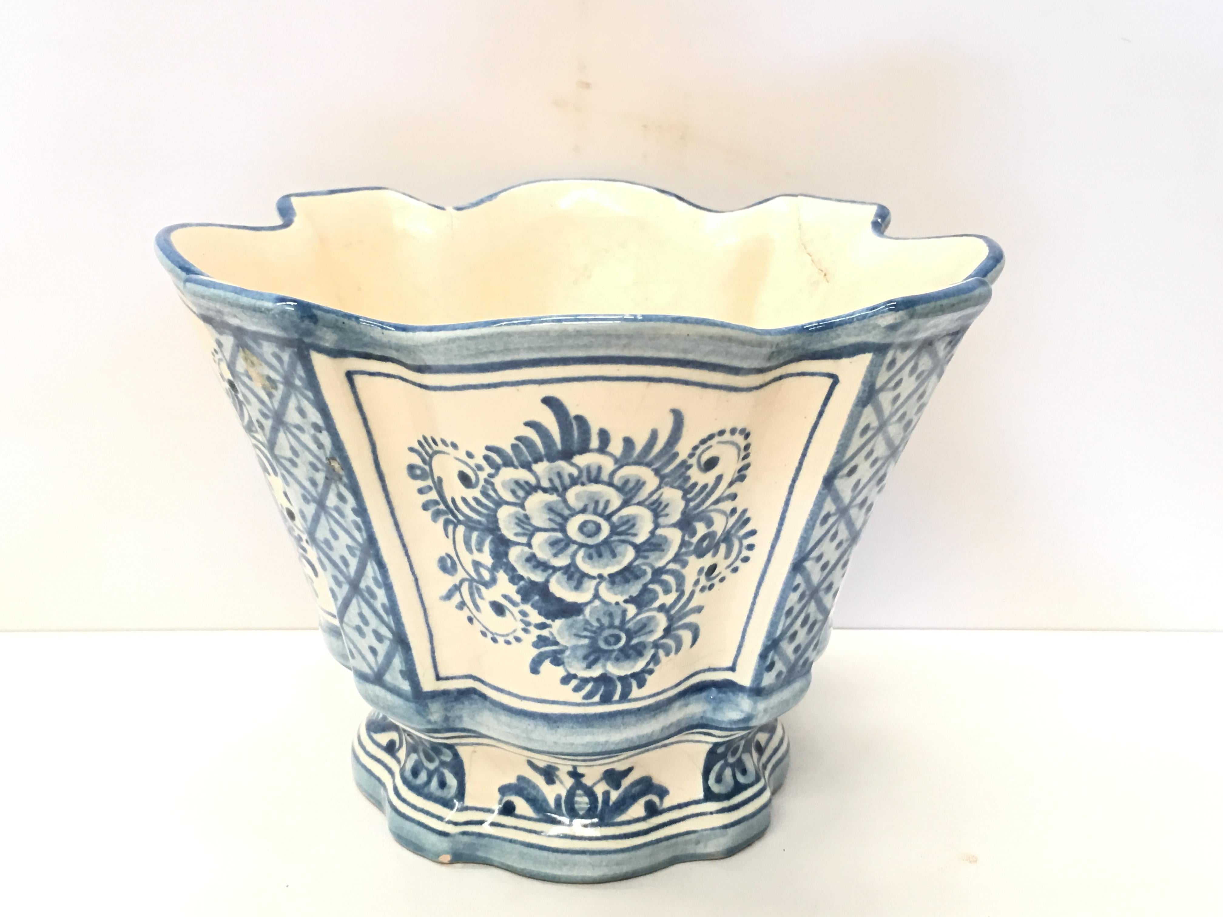 20th century Spanish blue white cache pot, scalloped edges and hand-painted Fleurs.