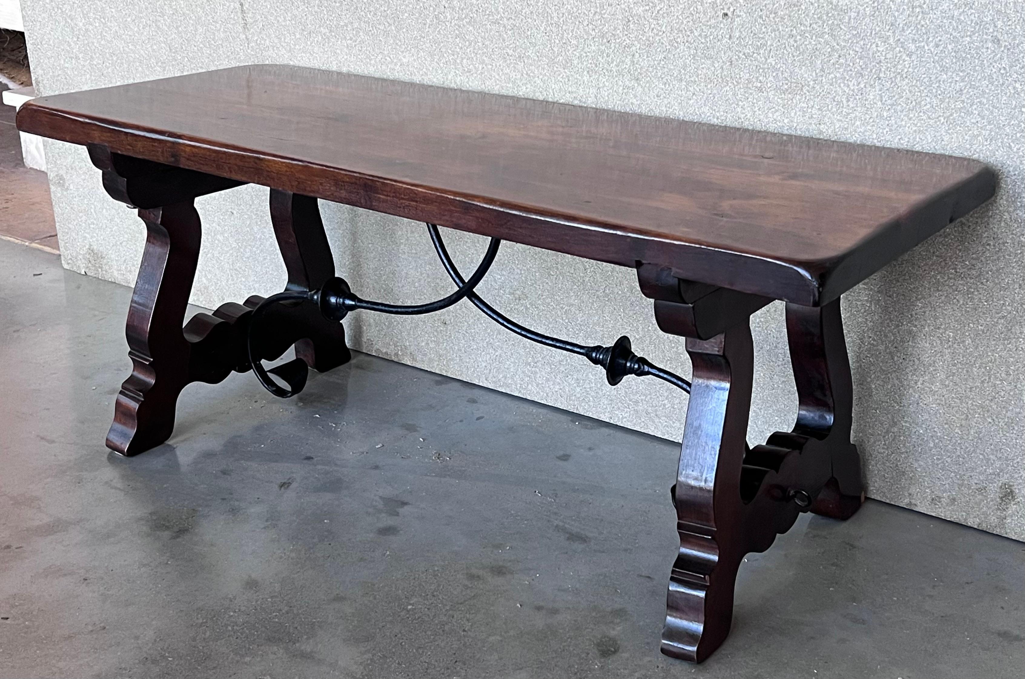 Walnut 20th Century Spanish Carved Table with Iron Stretchers For Sale