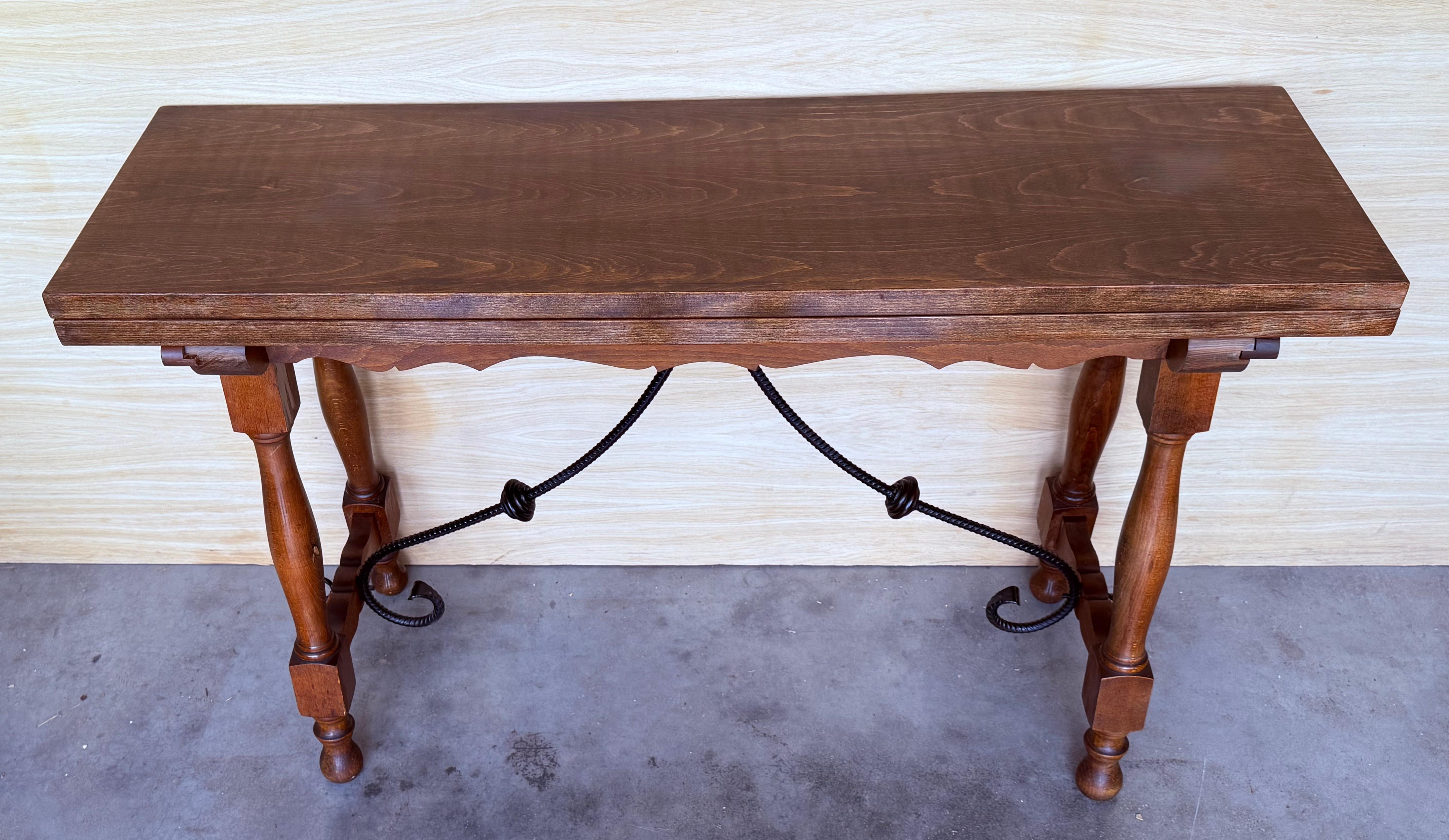 Iron 20th Century Spanish Console Fold Out Farm Table with Wood Stretcher For Sale
