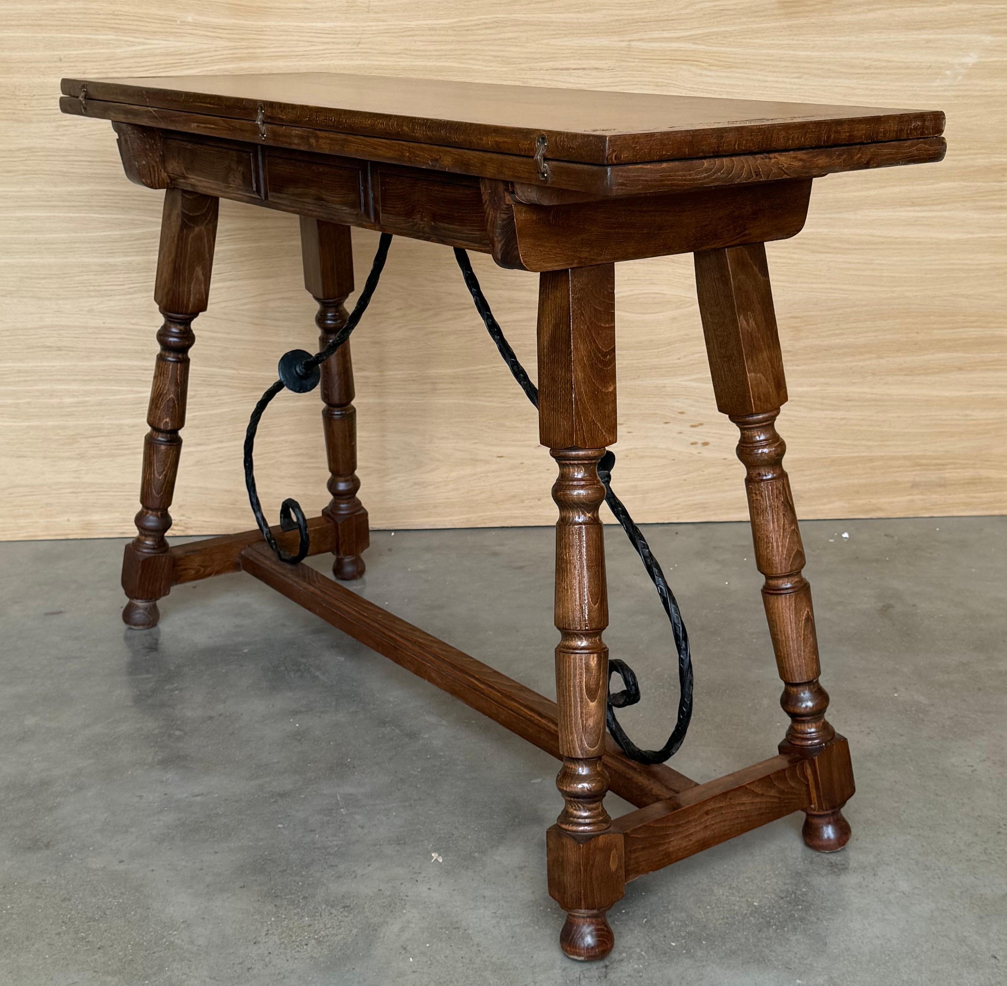 Iron 20th Century Spanish Console Fold Out Farm Table with Wood Stretcher For Sale