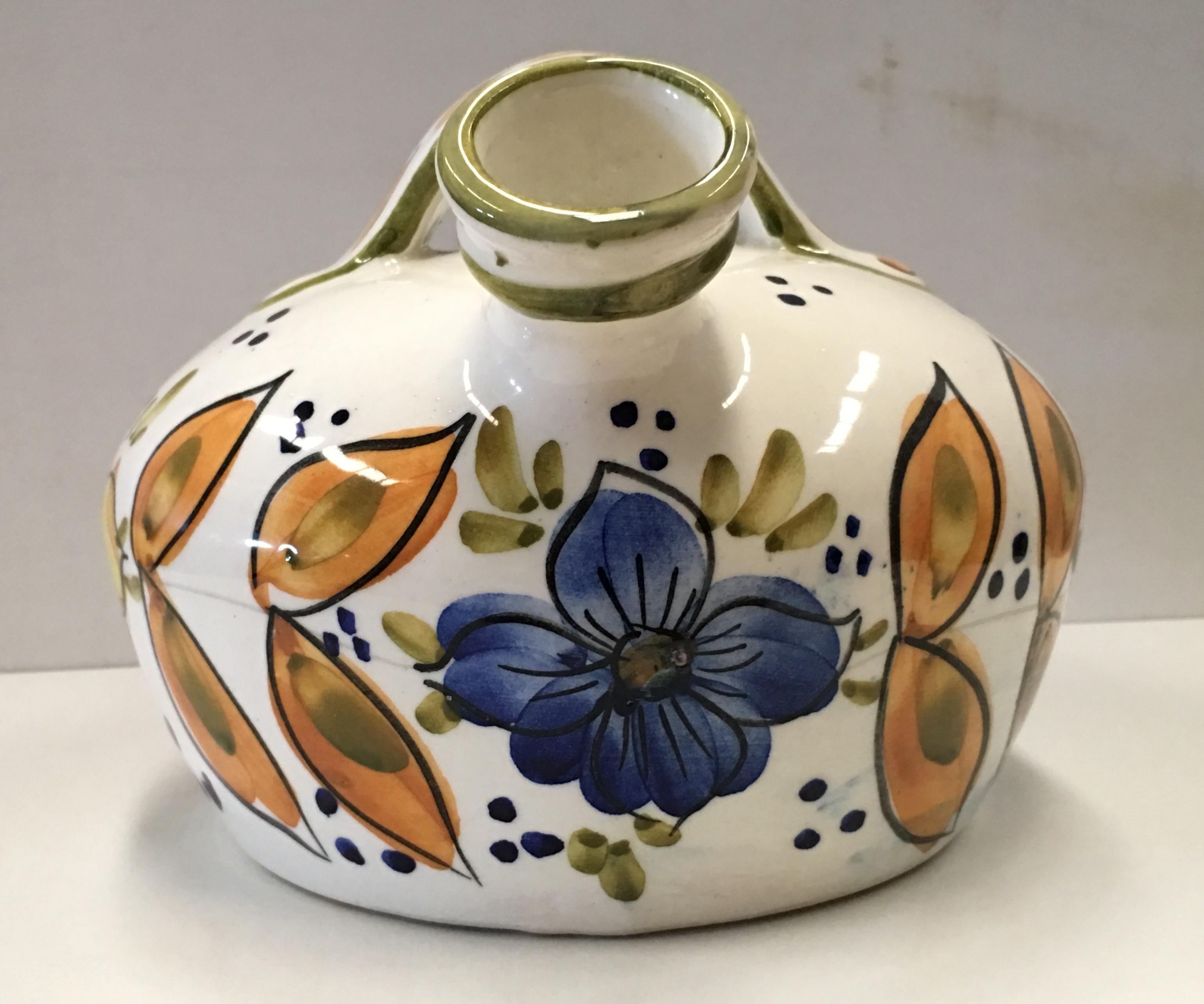 20th century Spanish glazed cruche or pitcher
The purpose of storing water in an earthenware pitcher is to keep the water cool.