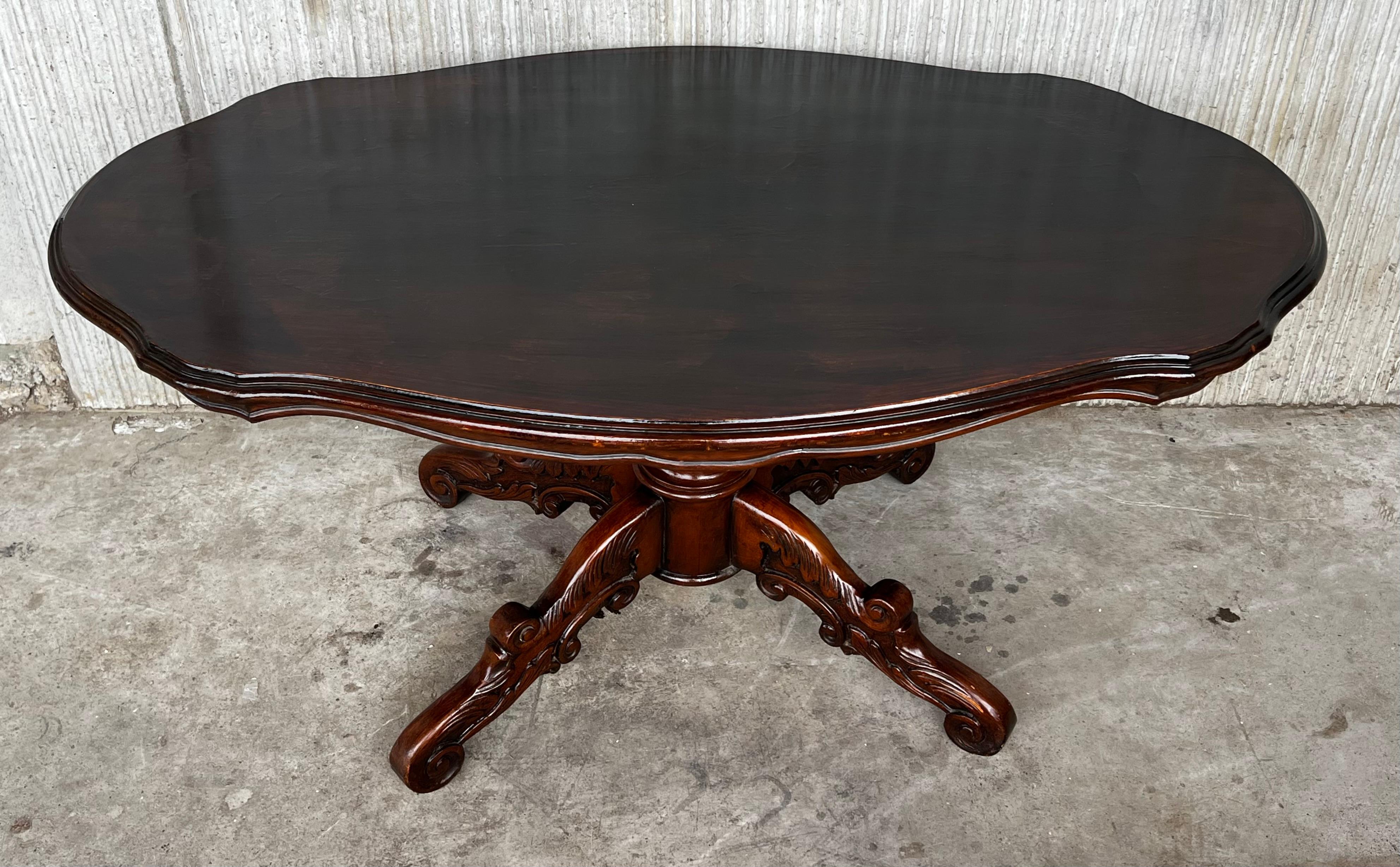 20th century Spanish Mariano Garcia carved pedestal coffee table.