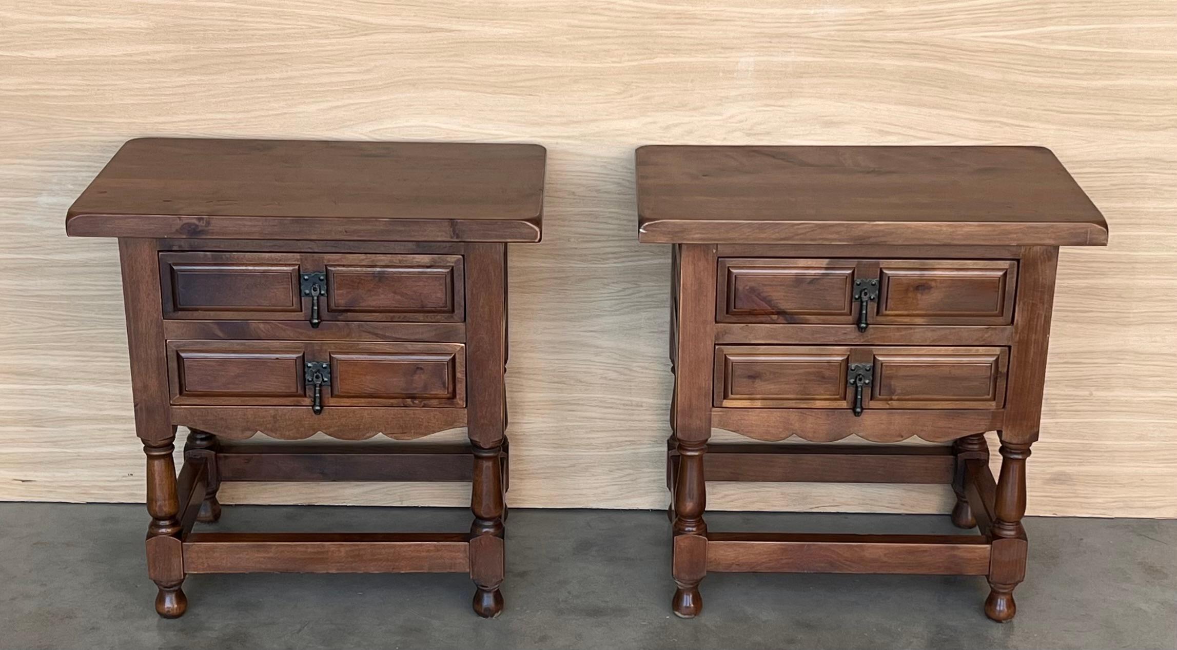 20th century pair of Brutalist Spanish nightstands with two carved drawers and iron hardware 
Beautiful tables that you can use like a nightstands or side tables, end tables... or table lamp.