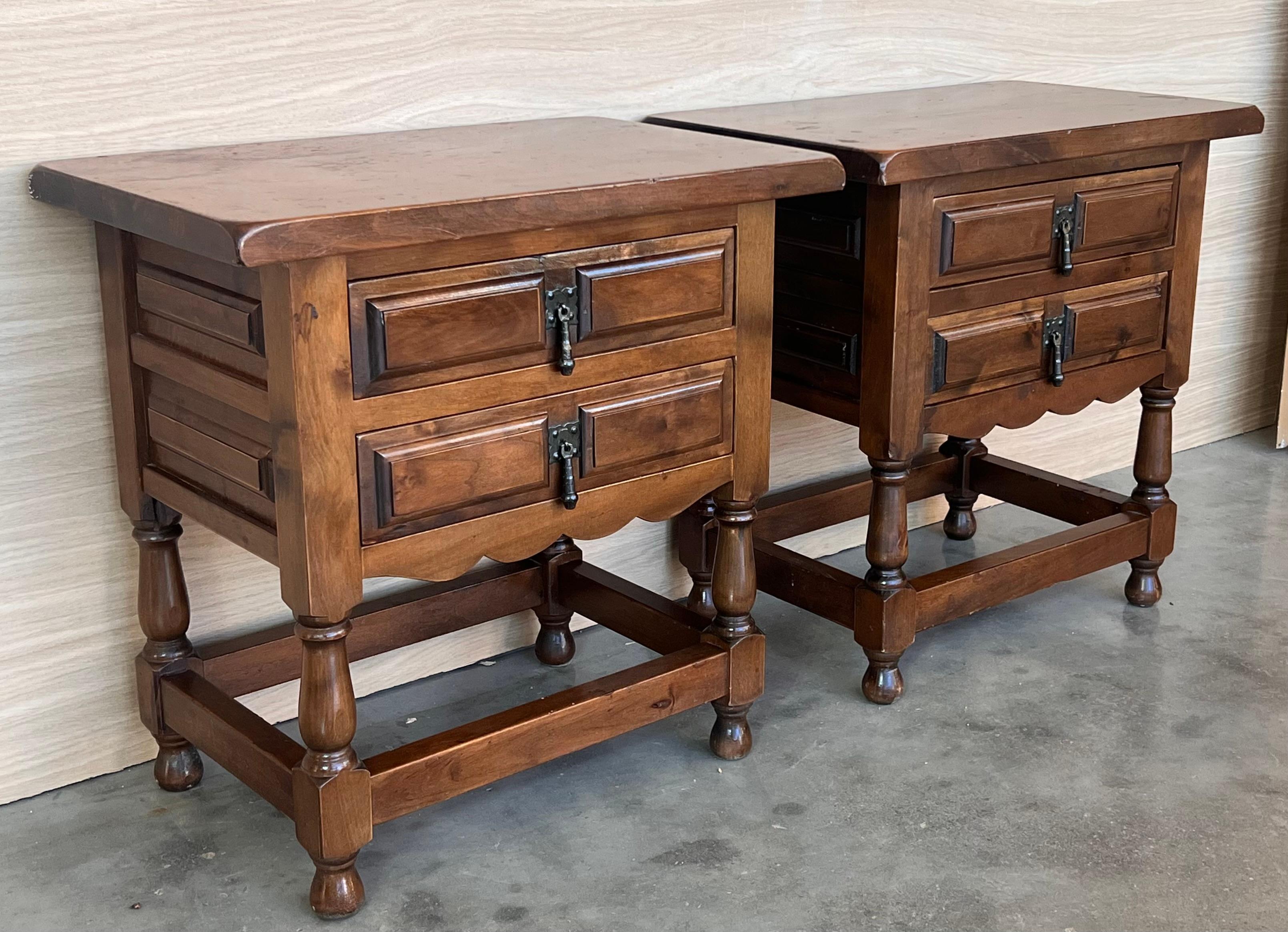 Carved 20th Century Spanish Nightstands with Two Drawers and Iron Hardware For Sale
