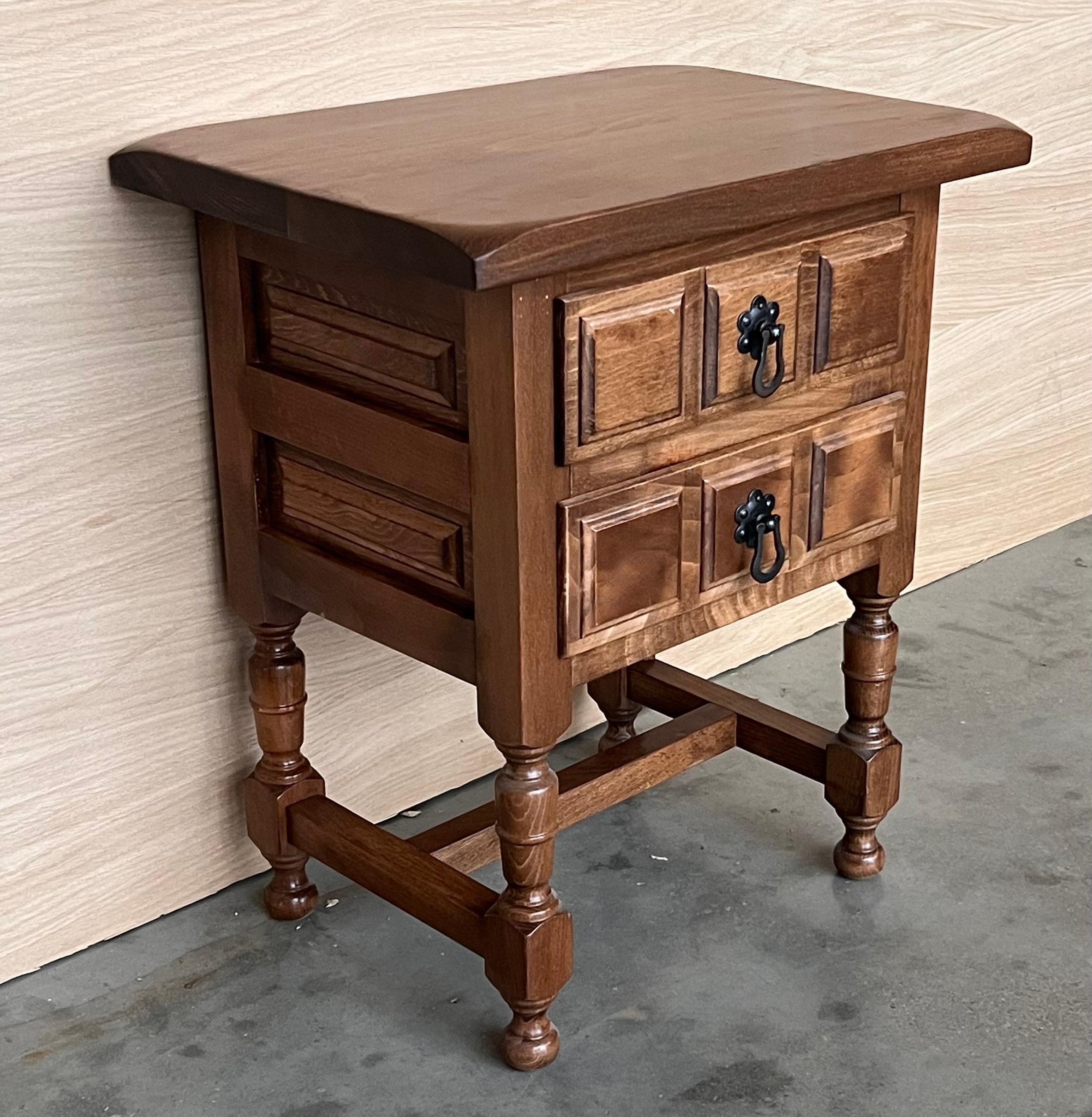 Carved 20th Century Spanish Nightstands with Two Drawers and Iron Hardware For Sale
