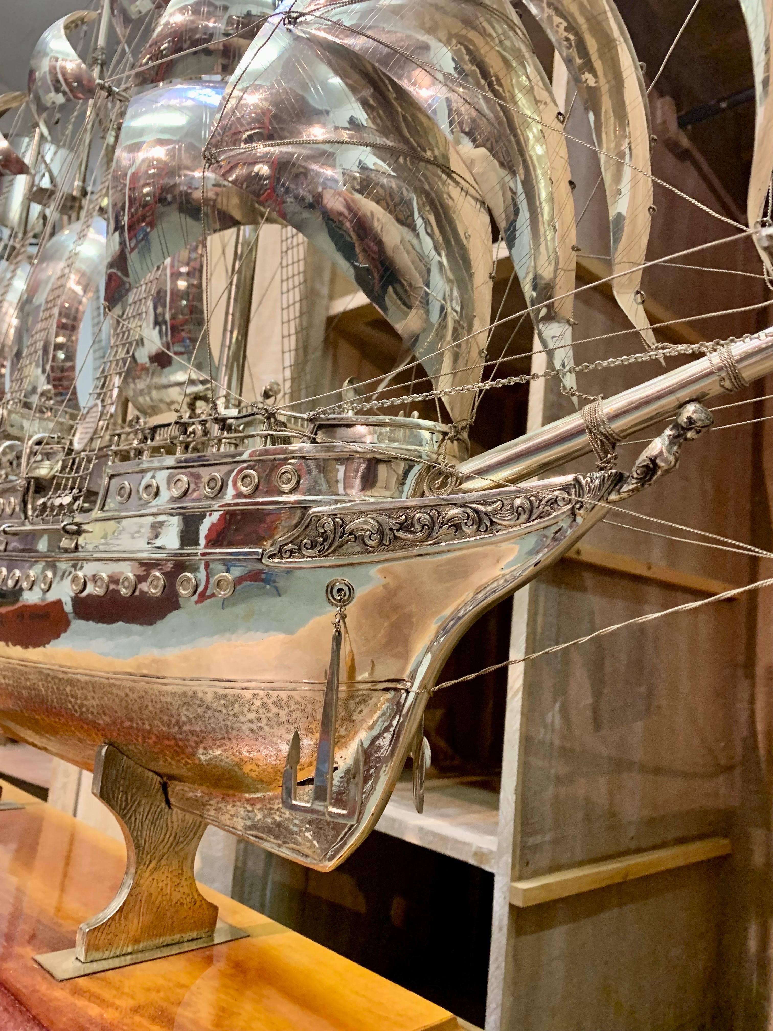 An impressive and large model of a ship in silver, made in Spain in the Mid-1960s, the ship model represents the Spanish navy training ship, Juan Sebastian Elcano, which continues to ply the oceans of the world today.
It is made with exceptional