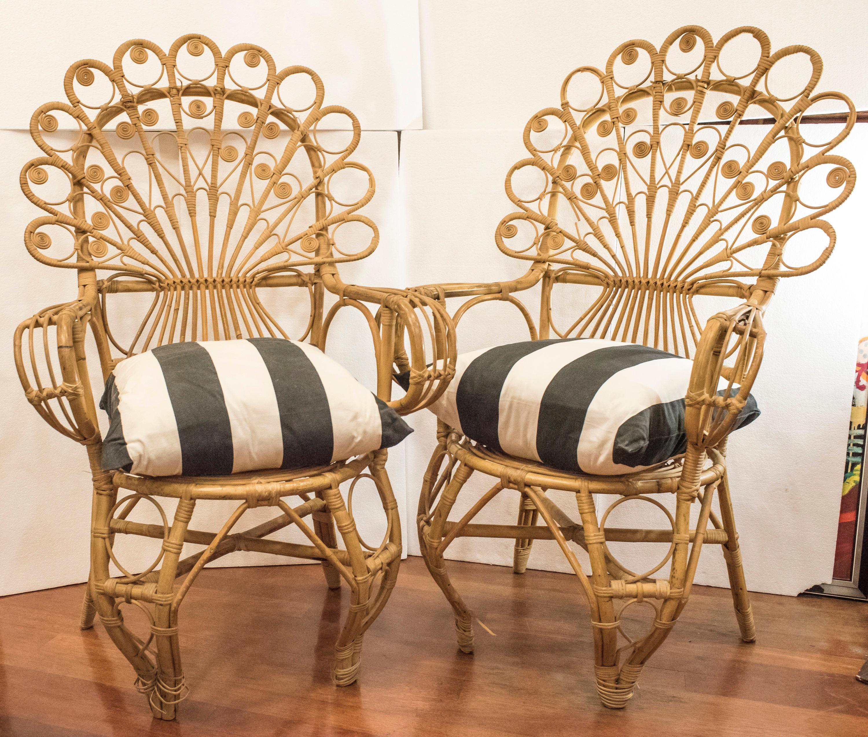 Amazing and rare couple of Spanish wicker armchairs .They are in very good condition with age and use, only a few little ornamental losses but the structure and the seat in perfect condition. They are really a delightful works of crafts, and sadly