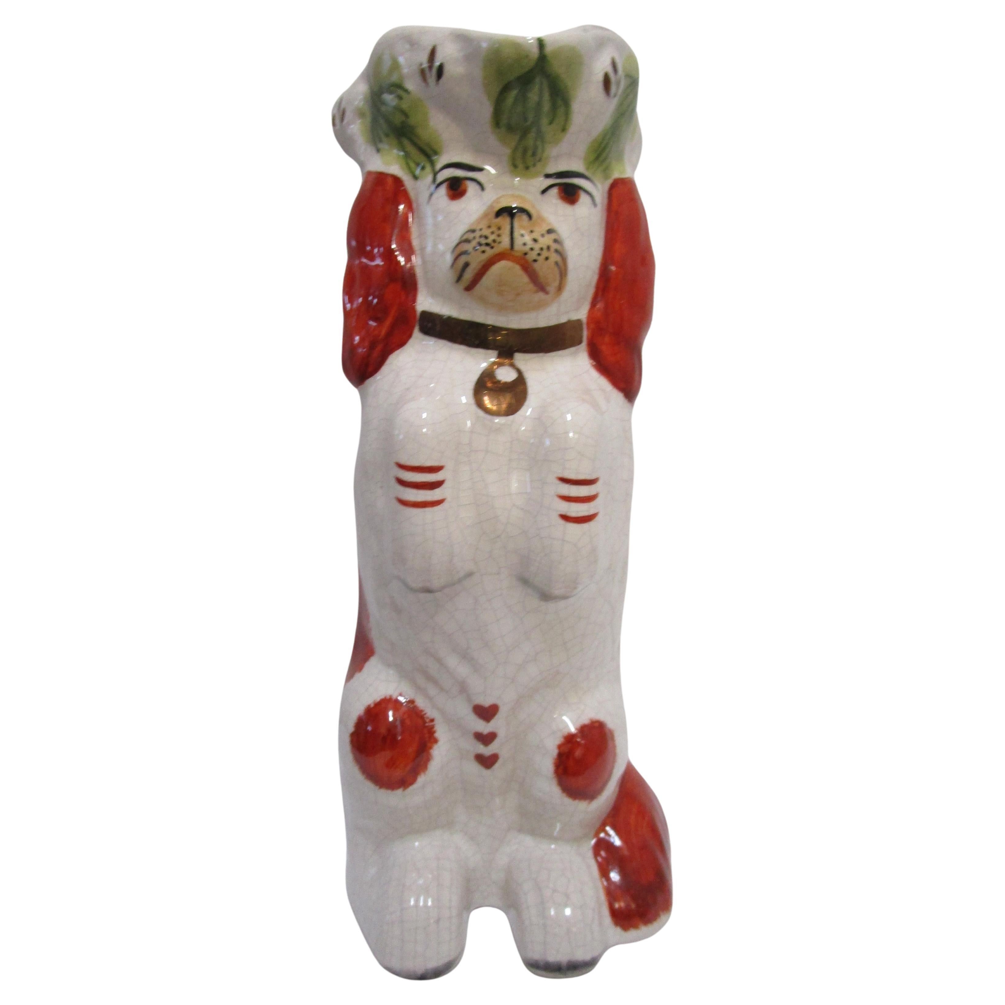 Caraffa Toby con Begging Spaniel rosso e bianco dello Staffordshire del XX secolo