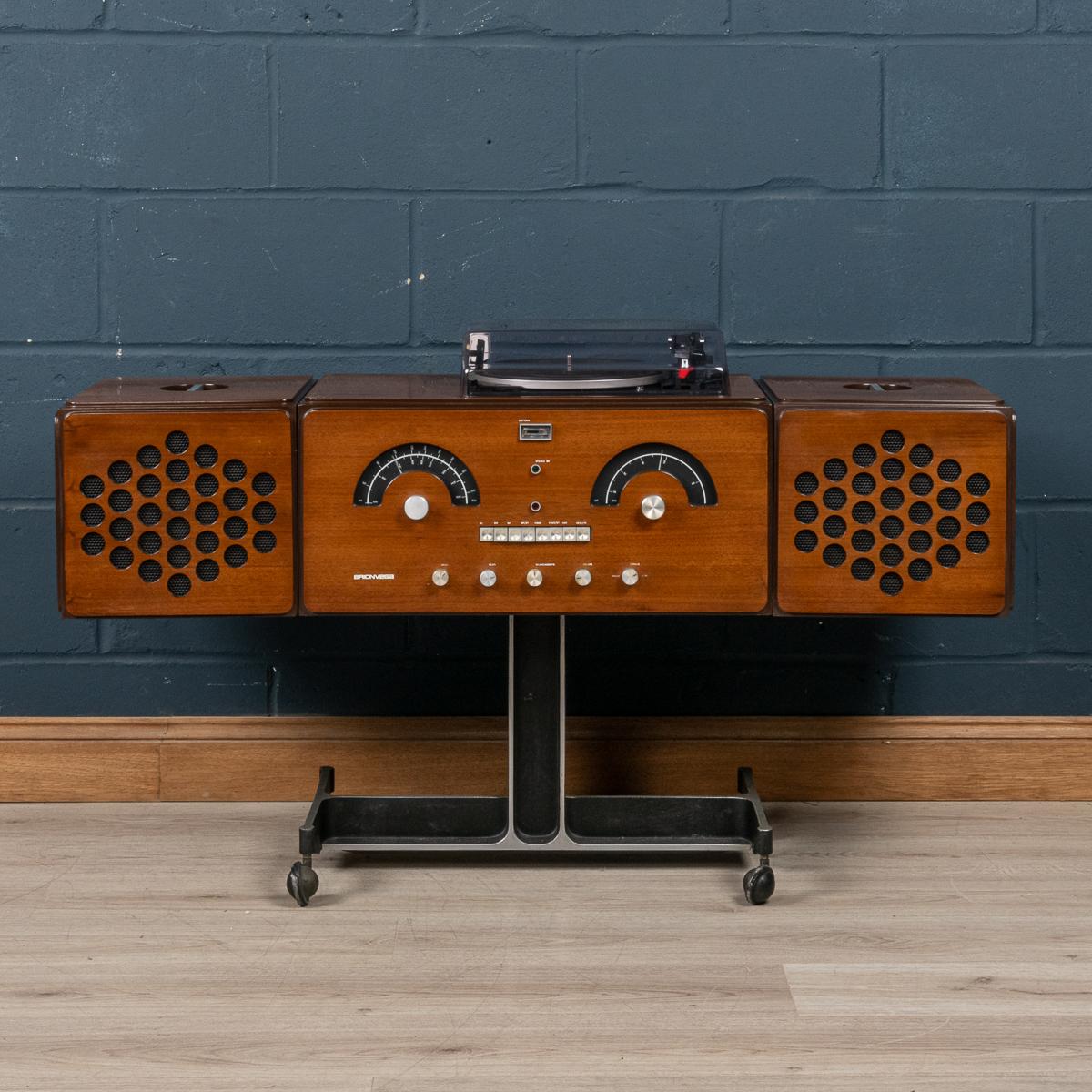 The Brionvega RR-126 is an icon of Pop design. It was conceived as an anthropomorphic ‘musical pet’, with speakers for ears and control dials for its face. It could be moved around easily on its castors, allowing it to operate in concert with other