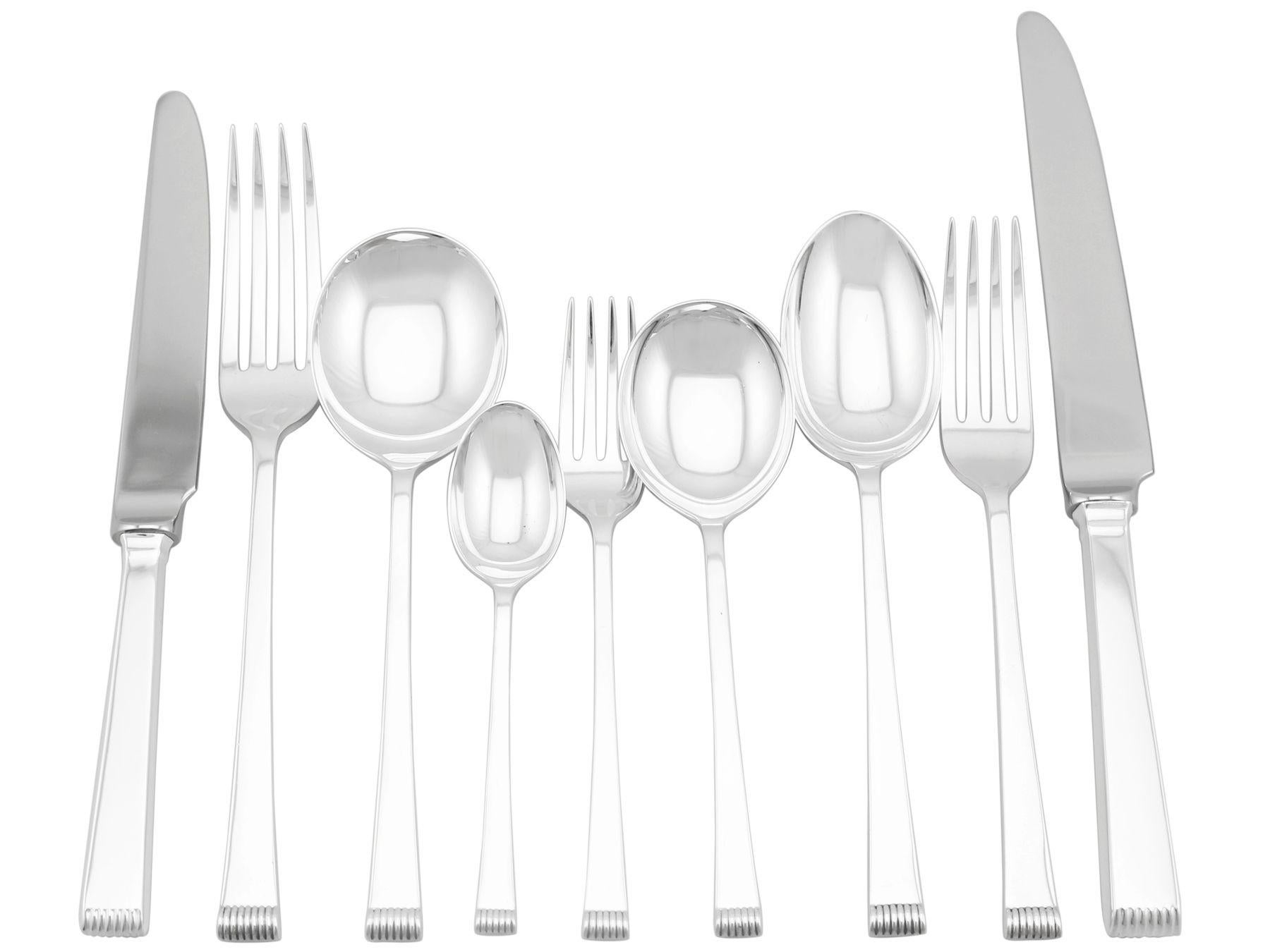 An exceptional, fine and impressive vintage Elizabeth II English sterling silver flatware service for eight persons; an addition to our canteen of cutlery collection.

The pieces of this exceptional vintage Elizabeth II straight sterling silver