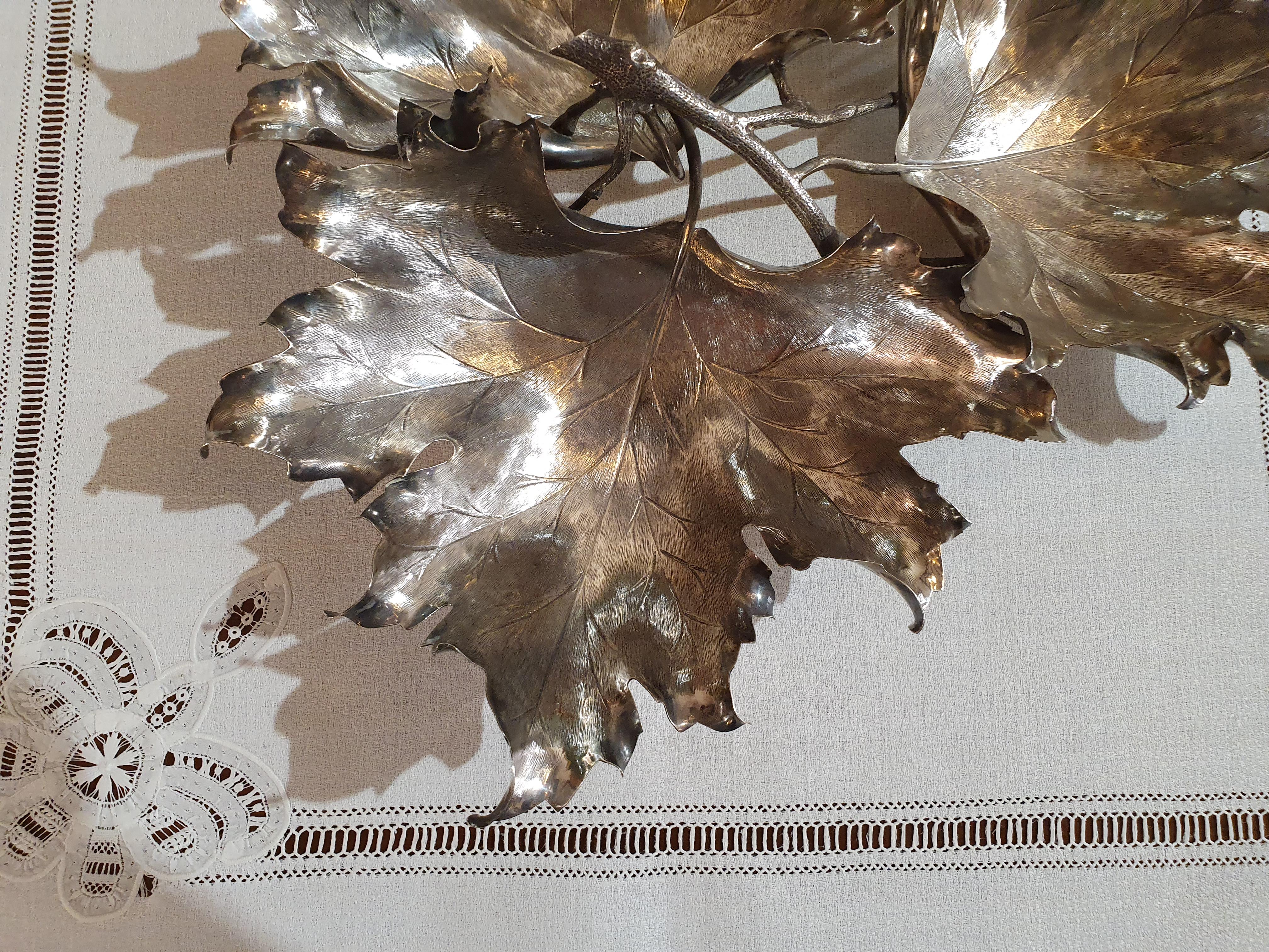 Outstanding large sterling silver handmade leaf motifs centerpiece by Ilario Pradella for Bellezza Cagliari. New, never used
Pradella Iario, founded in 1920, was the greatest Italian silversmith of the second half of the 20th century, famous for