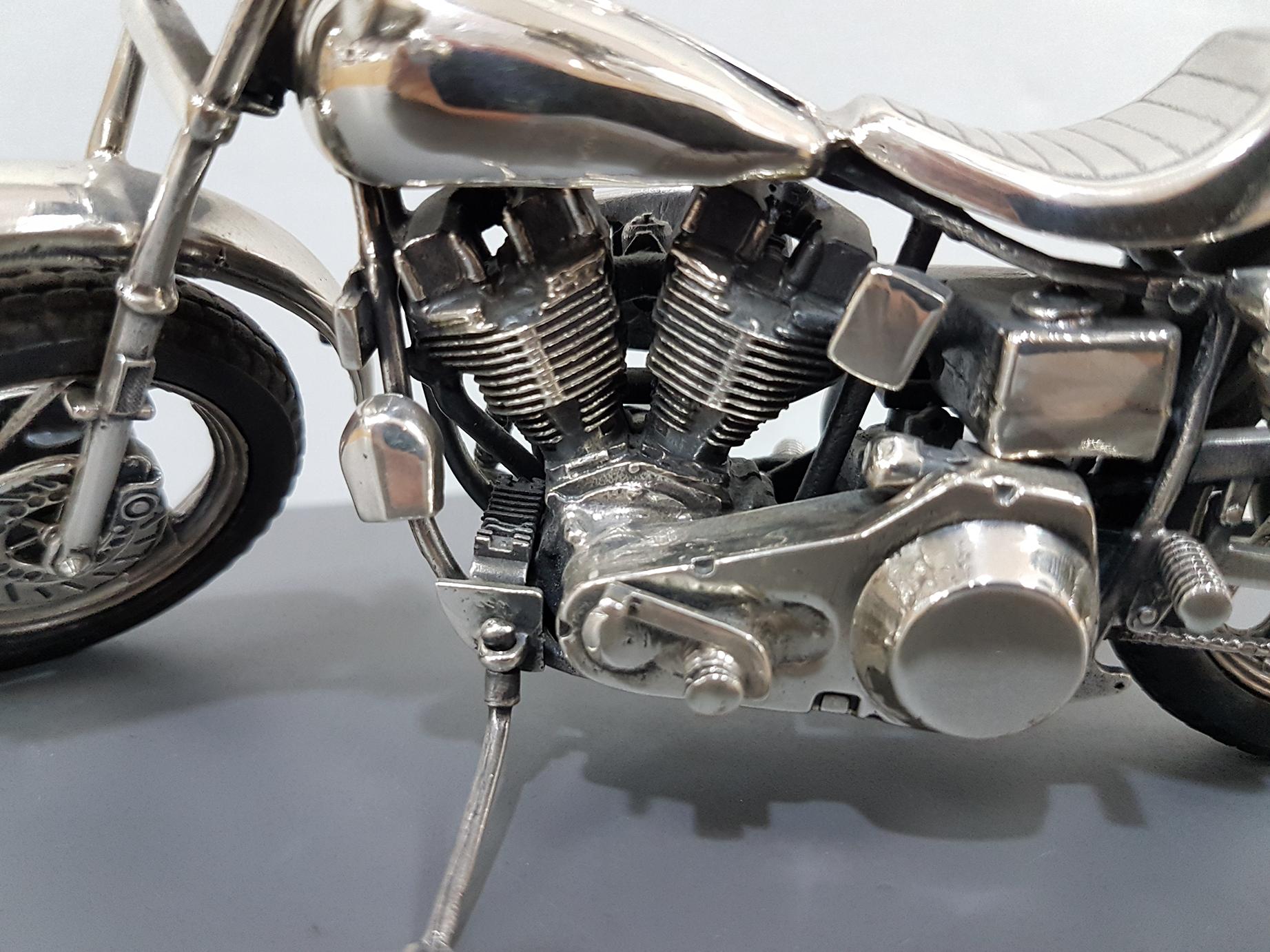 Vintage Harley Davidson motorcycle in sterling silver with very accurate detail reproduction.
The first is a Harley Davidson FXSB low rider 1340 shovel head 
The wheels are with spokes and rubber tires
Completely handmade. Made in Italy
424