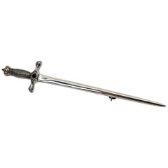 Retro 20th Century Sterling Silver Sword Pin Brooch with Garnet Accent