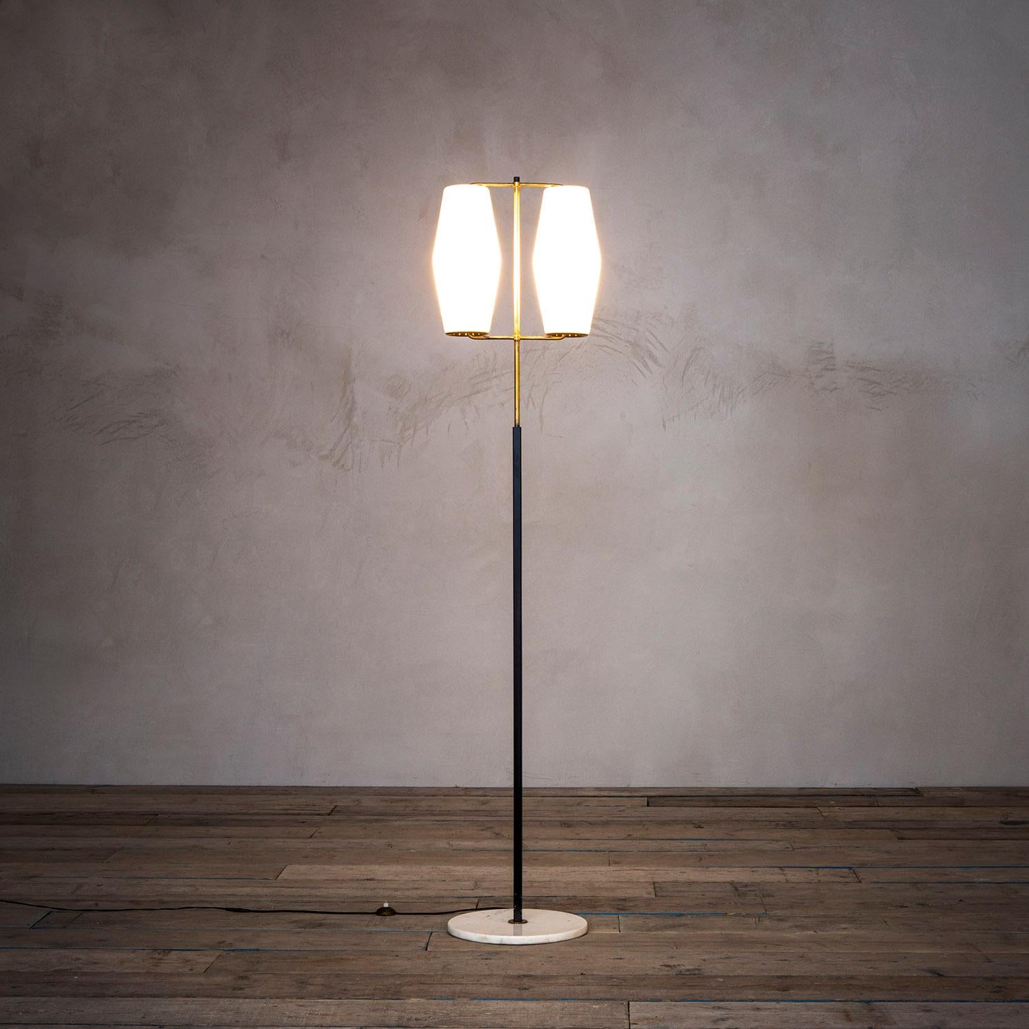Floor lamp by Stilnovo of '50s with base in white marble, structure in brass and lacquered metal, couple of diffusers in opal glass. 
Very good condition, original in all its parts, fully working.
The light can be rewired for US standards upon
