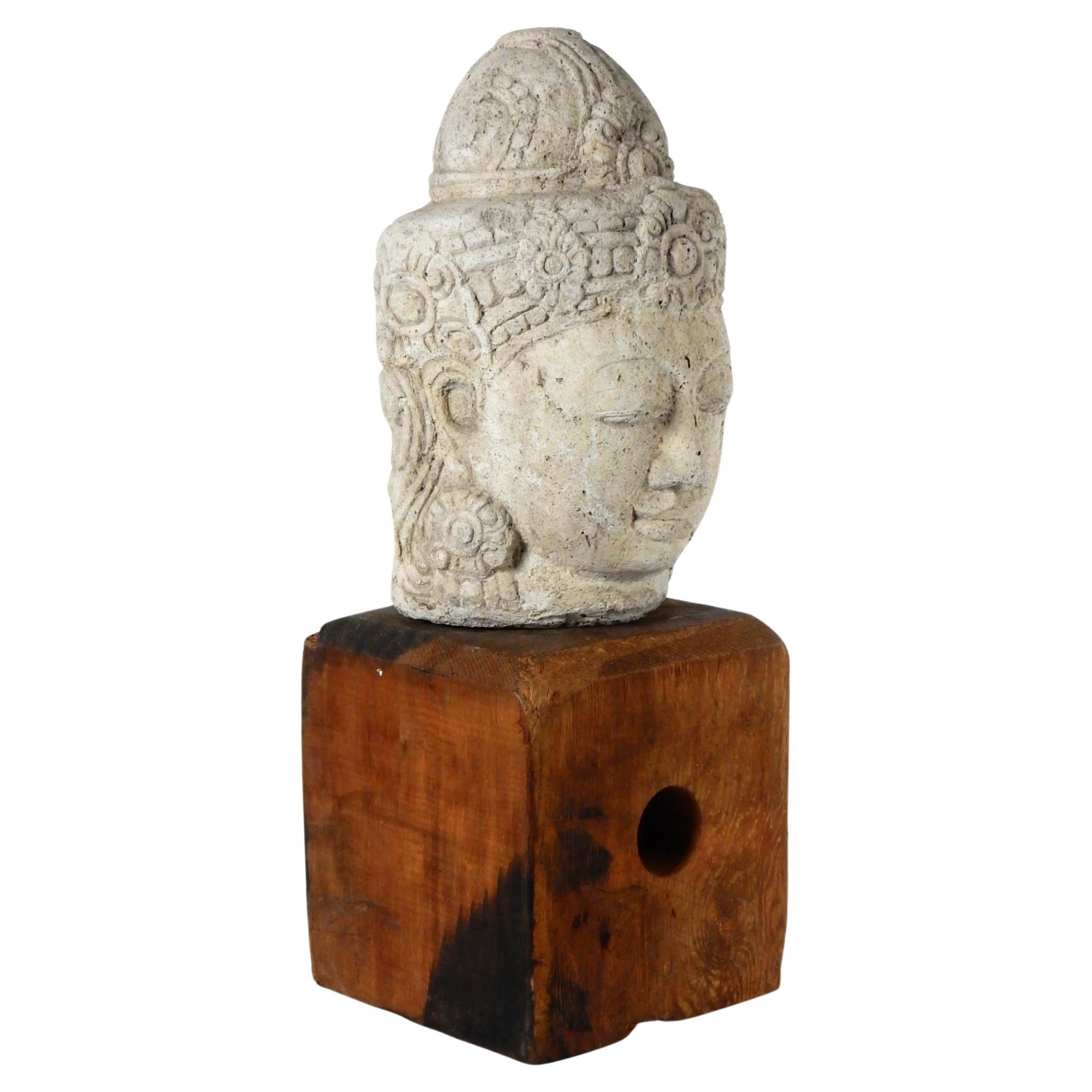 Large stone head of Buddha on a reclaimed wood plinth.
Circa 1940's-60's. Eclectic decor item.
Stands 30in tall as pictured.
Head not attached to plinth.