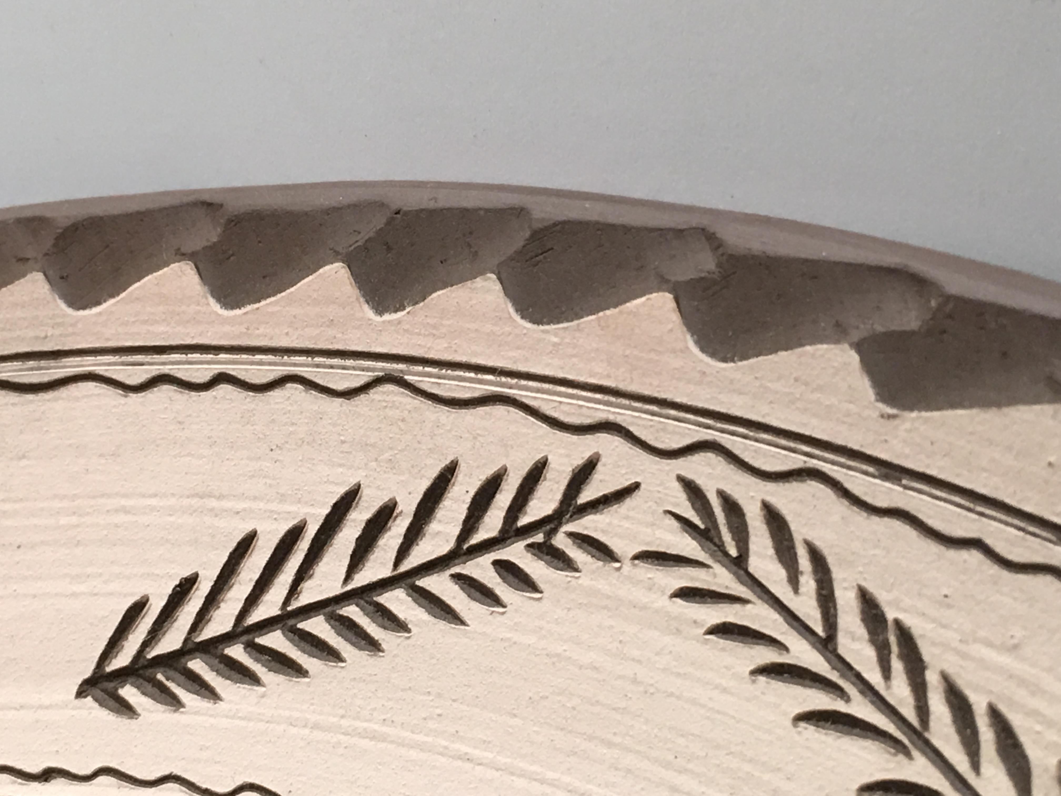20th Century Stoneware Matte Dish with Ornamentals Relief Motifs In Excellent Condition For Sale In Miami, FL