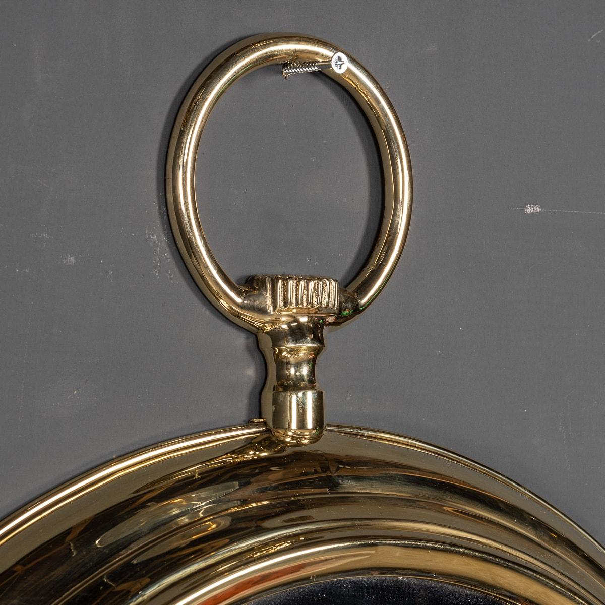 Brass 20th Century Striking Collection Of Pocket Watch Shaped Mirrors, c.1950-1970