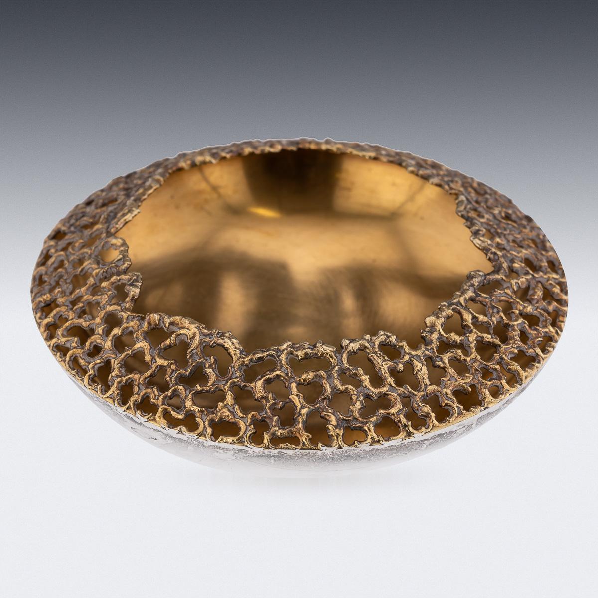 Modern 20th Century Stuart Devlin solid silver gilt cigar ashtray, the textured surface with an organically formed border, the plain bowl resting on a circular foot. Hallmarked English Silver (925 Standard), London, year 1972 (r), Maker's mark S.D