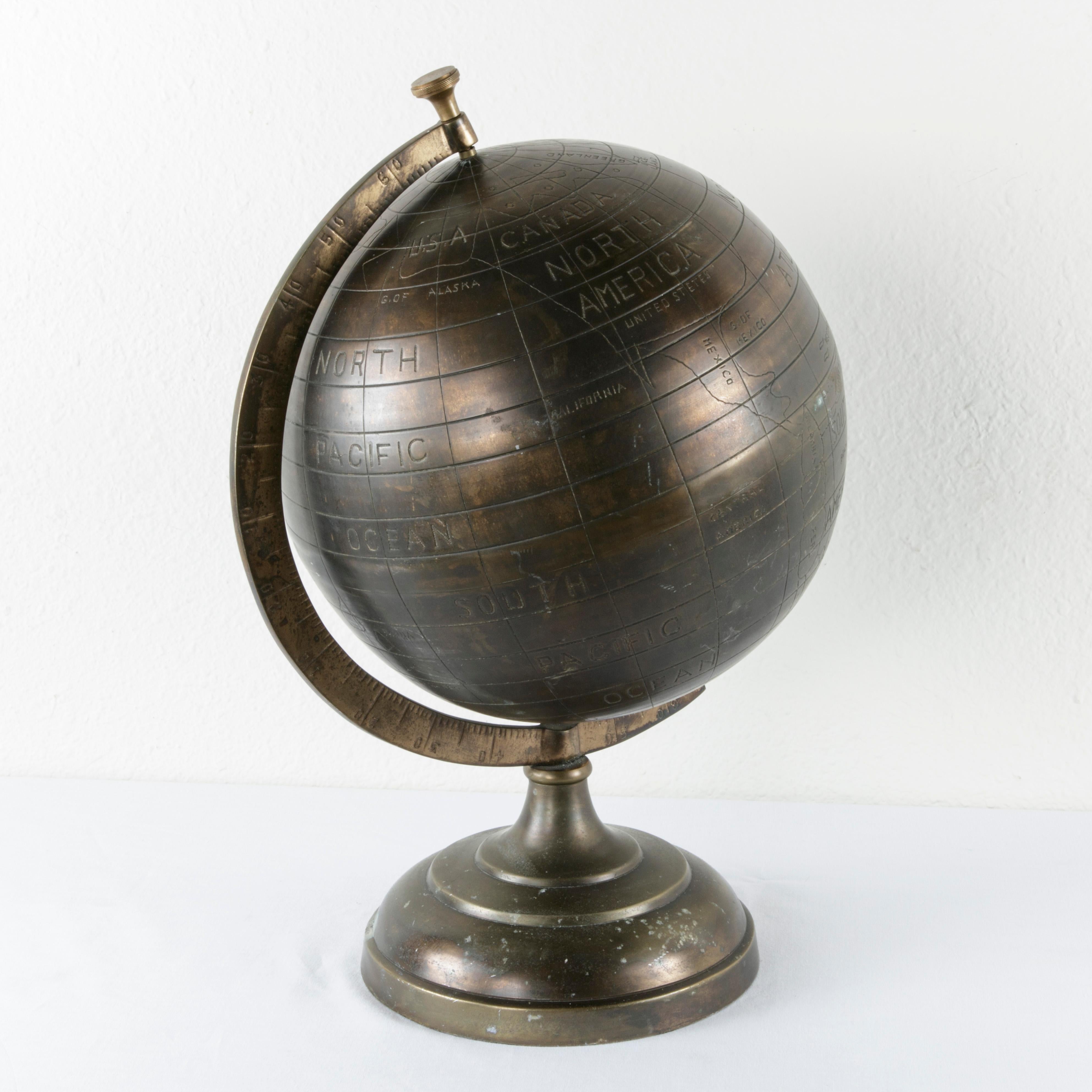 British 20th Century Stylized Etched Bronze Globe on Axis Labeled in English