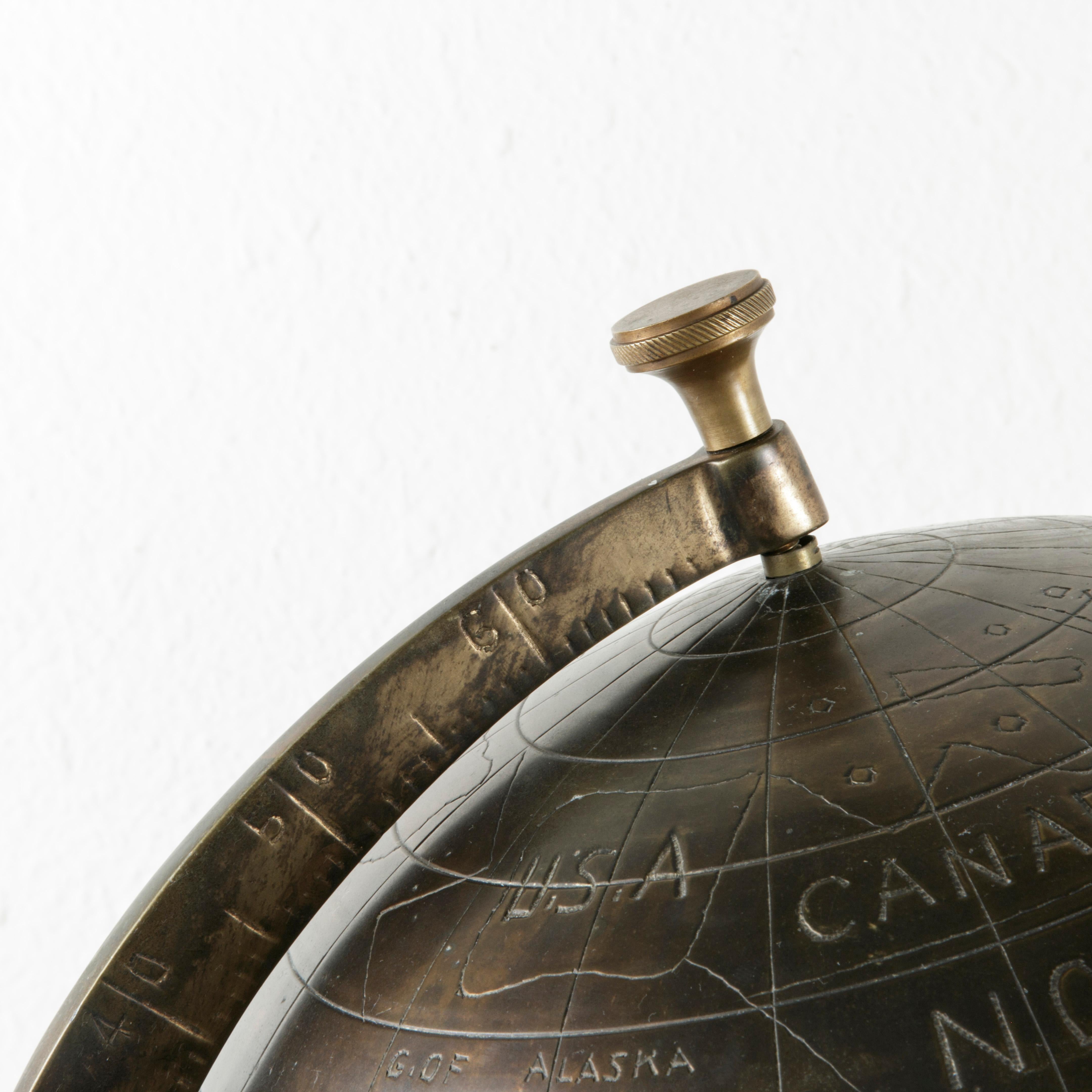20th Century Stylized Etched Bronze Globe on Axis Labeled in English In Good Condition In Fayetteville, AR