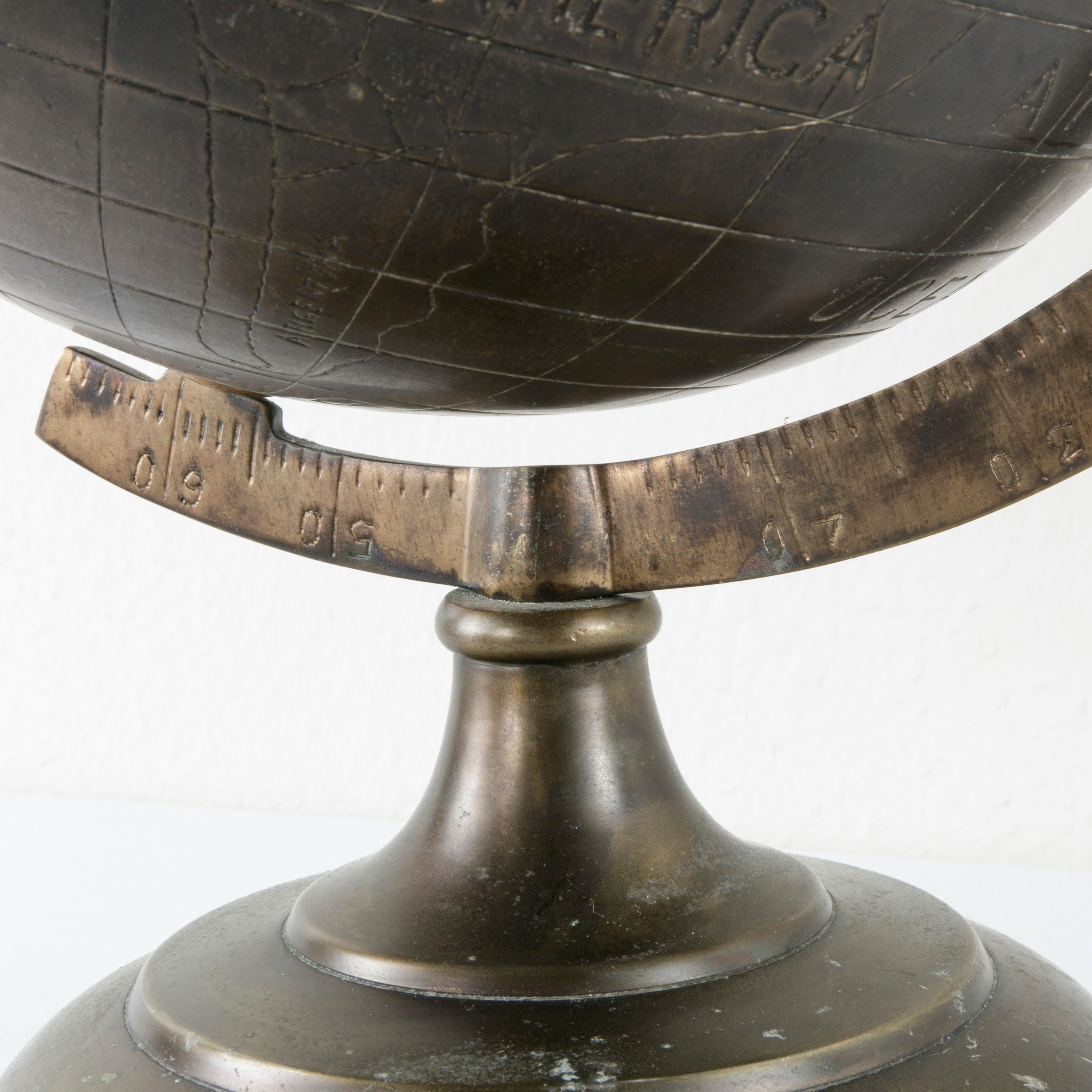 20th Century Stylized Etched Bronze Globe on Axis Labeled in English 1