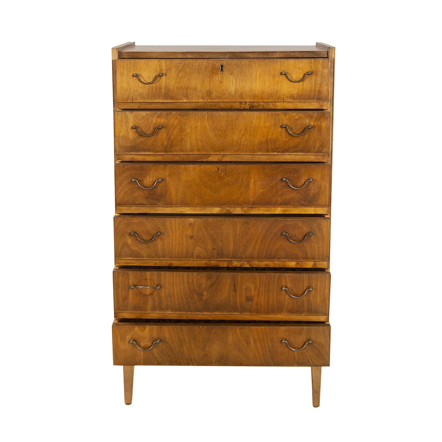 A vintage Swedish Art Deco bureau, semainier chest made of hand crafted polished, partly veneered Birchwood, in good condition. The Scandinavian cupboard is composed with six drawers and two handles, pulls consisting its original chrome hardware and