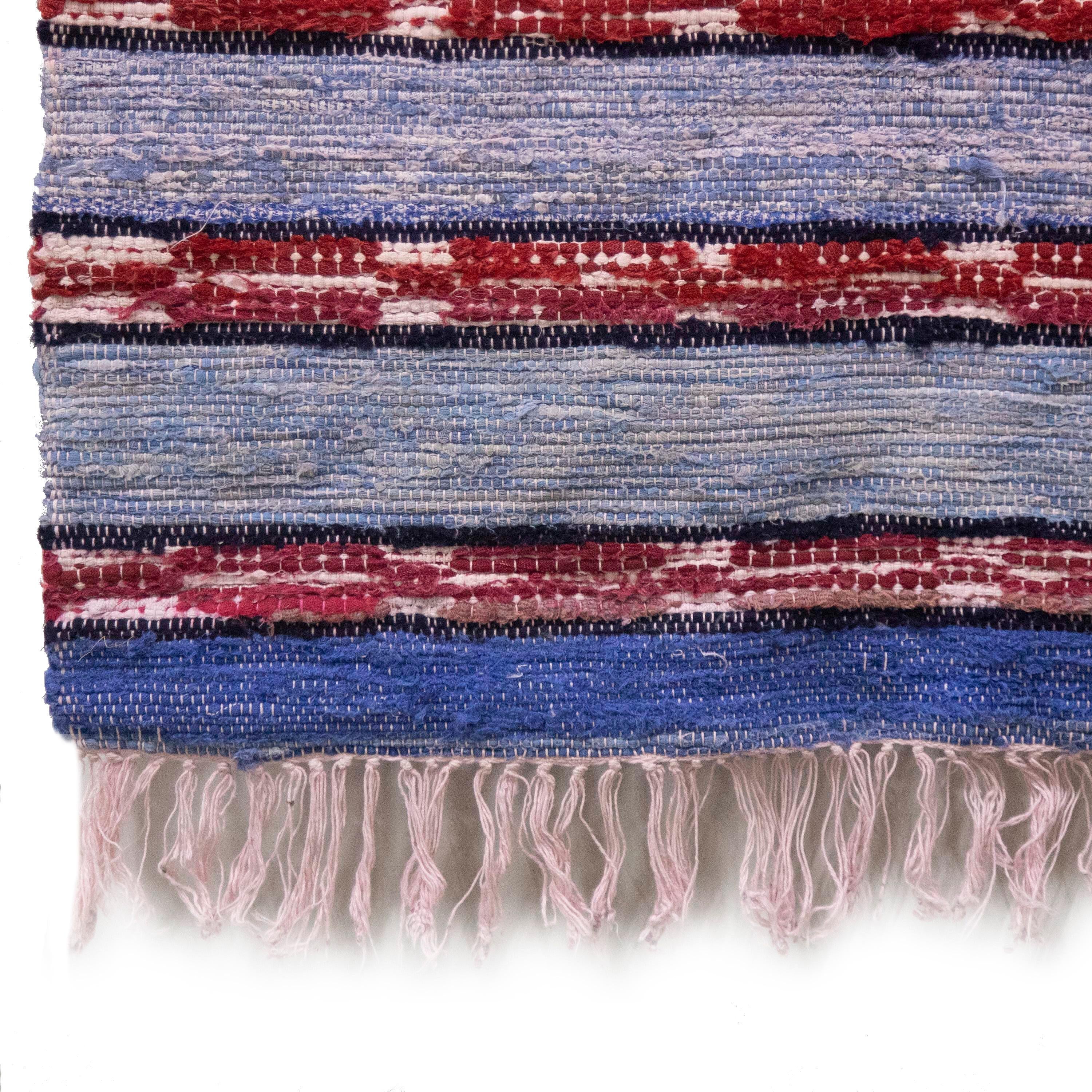 20th Century Swedish rag rug. Featuring a large stripe design throughout in tones of purple, blue and red. This rug can be machine-washed at 30 degrees.
RT6024489