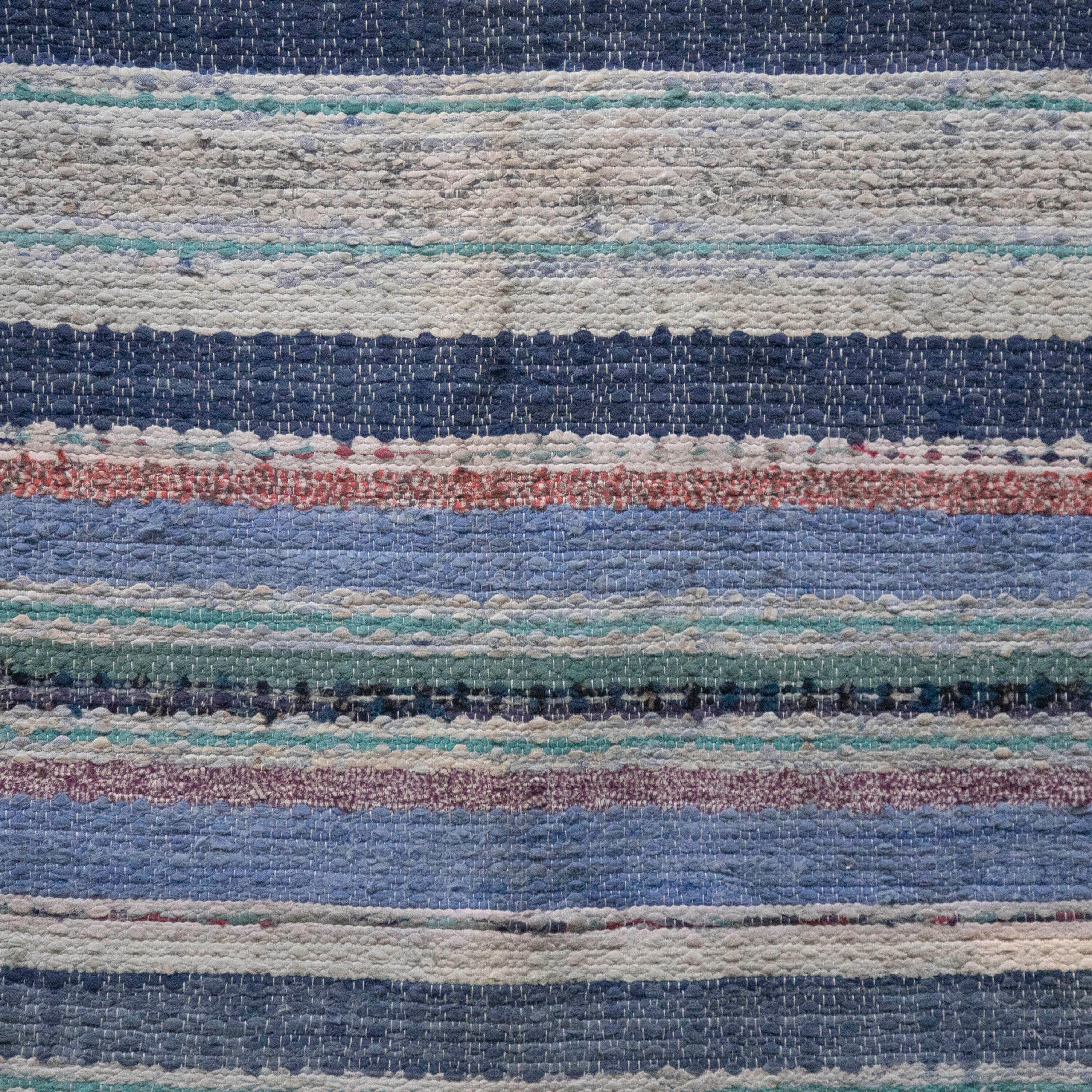 20th Century Swedish rag rug. Featuring a stripe design in tones of blue and green. This rug is machine washable at 30 degrees.
RT6024595