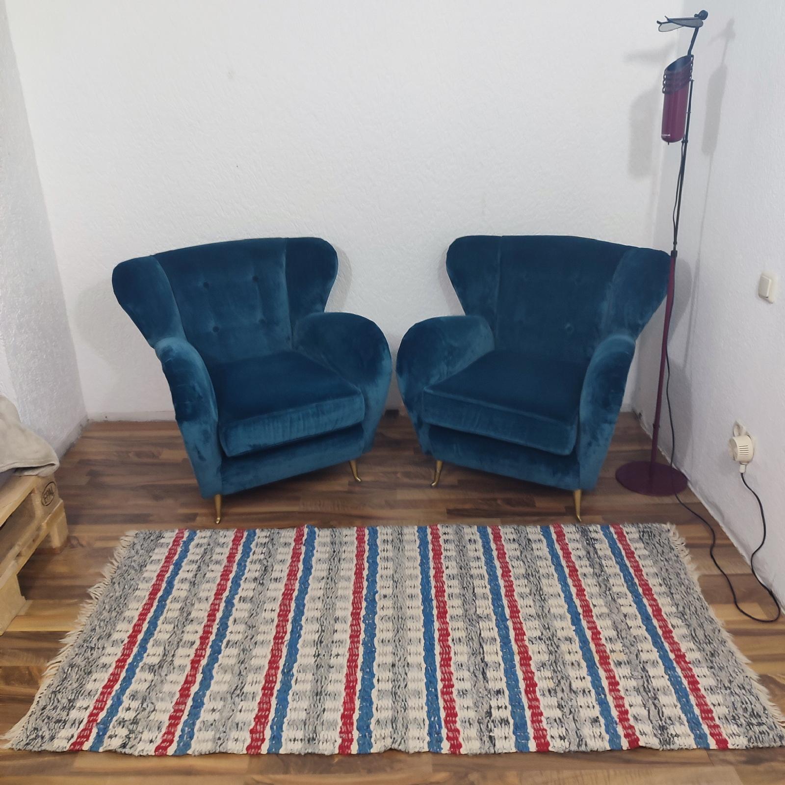 Mid-20th-century Swedish rag rug. It features a geometric stripe design in muted tones of ecru, grey, blue, and red.
86x186 cm
In a very good used condition.