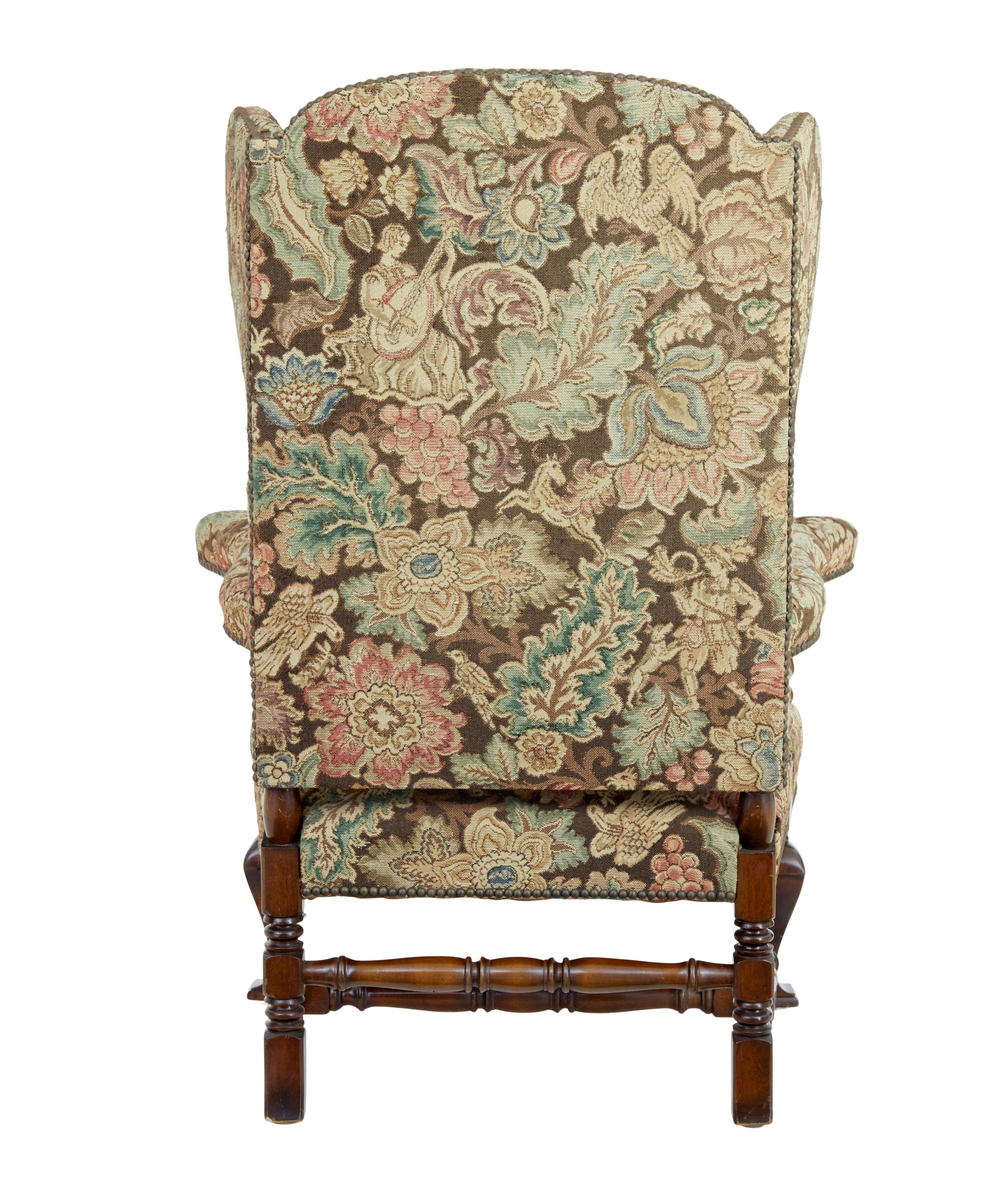 Hand-Carved 20th century tapestry wingback armchair For Sale